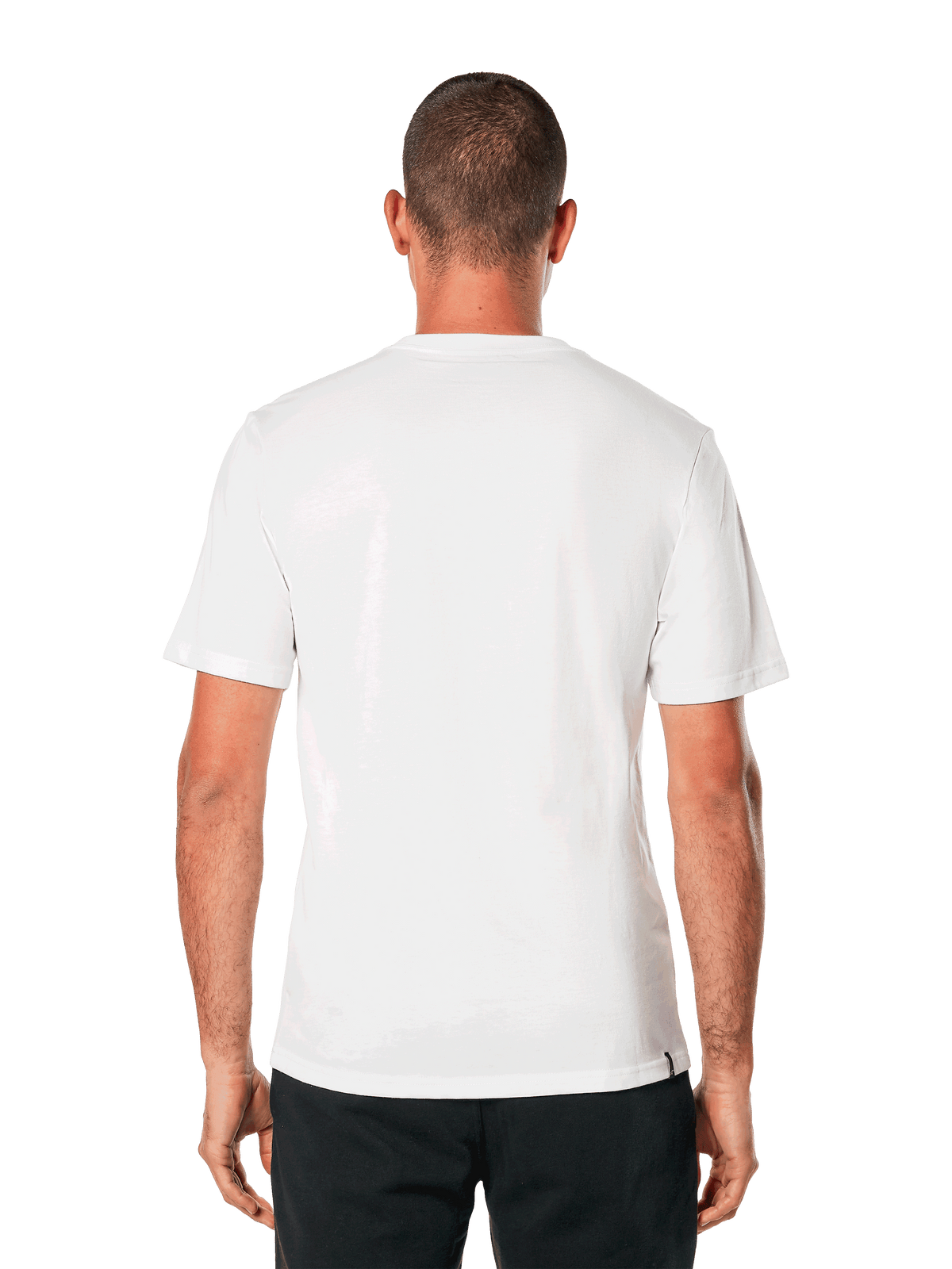 Alpinestars MX Helmet CSF Tee, kortärmad t-shirt, vit, vy bakifrån, bärs med svarta byxor, avslappnad motorsportinspirerad design
