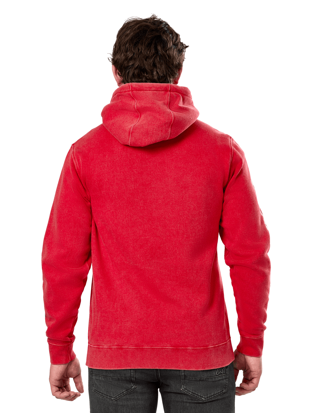 Alpinestars Unbound Hoodie, baksidan av röd plaggfärgad fleecehoodie i pullover-modell, avslappnad streetwear, med ribbade muddar och fåll, självfodrad huva, bärs med mörka byxor