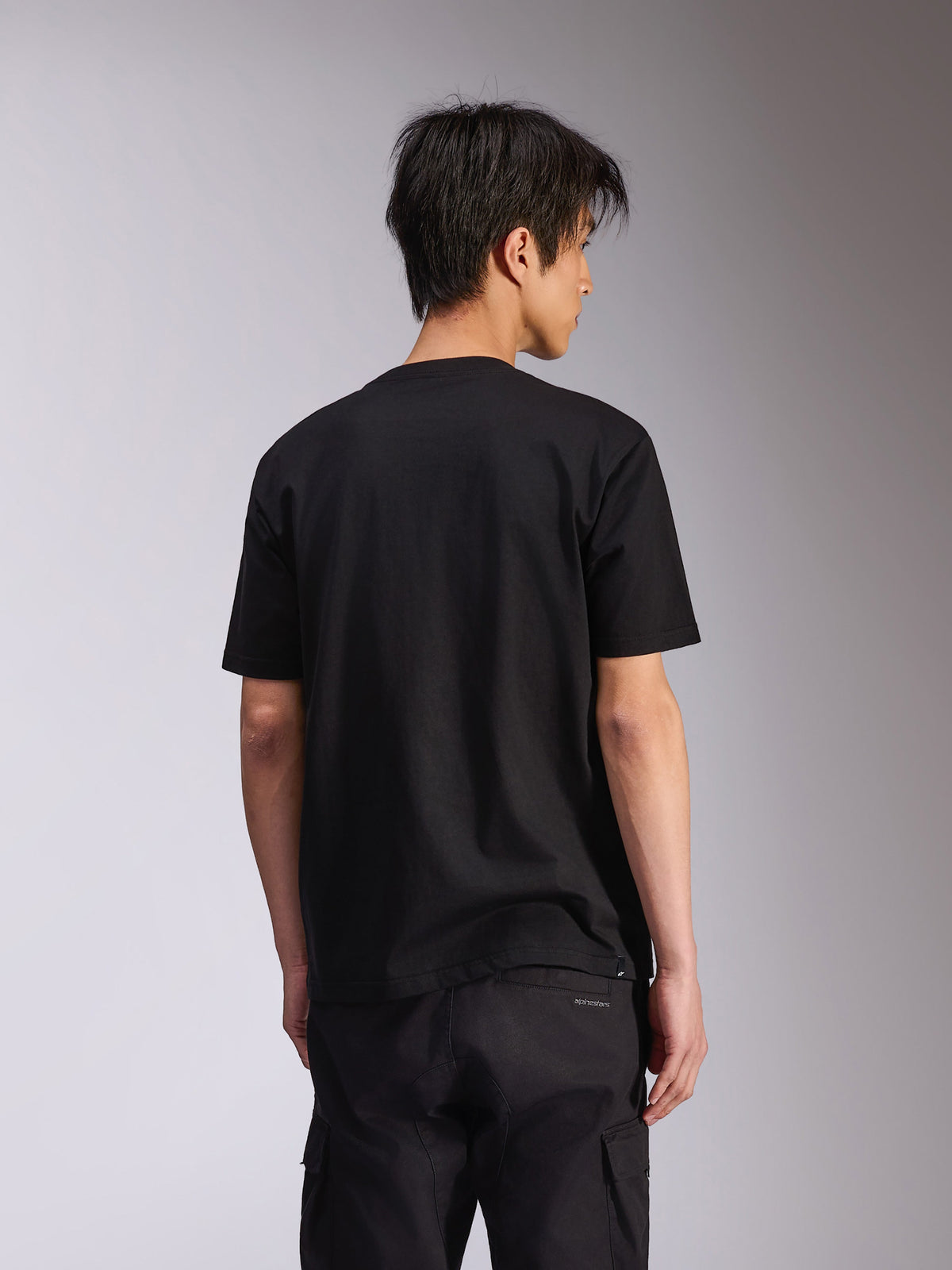 Alpinestars Noka CSF Tee, kortärmad t-shirt, svart, vy bakifrån, vardaglig motorsport-inspirerad streetwear