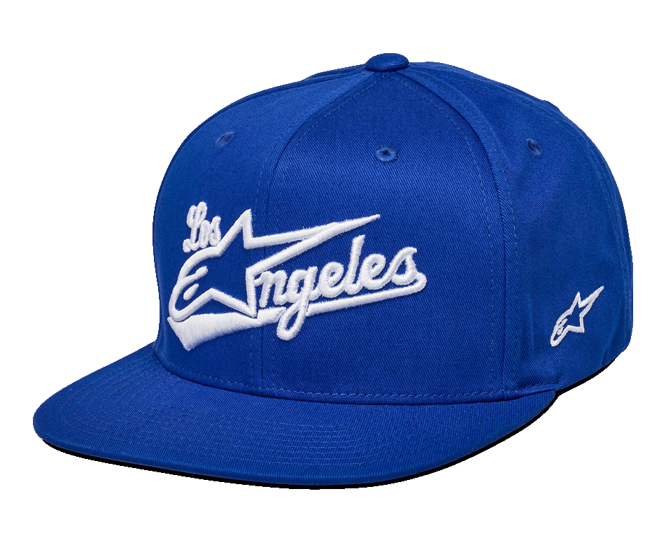 Alpinestars Los Angeles Hat, blå snapback-keps med vit 3D-broderad Los Angeles-logotyp i athletic-typsnitt, platt skärm, strukturerad krona, motorsportinspirerad design