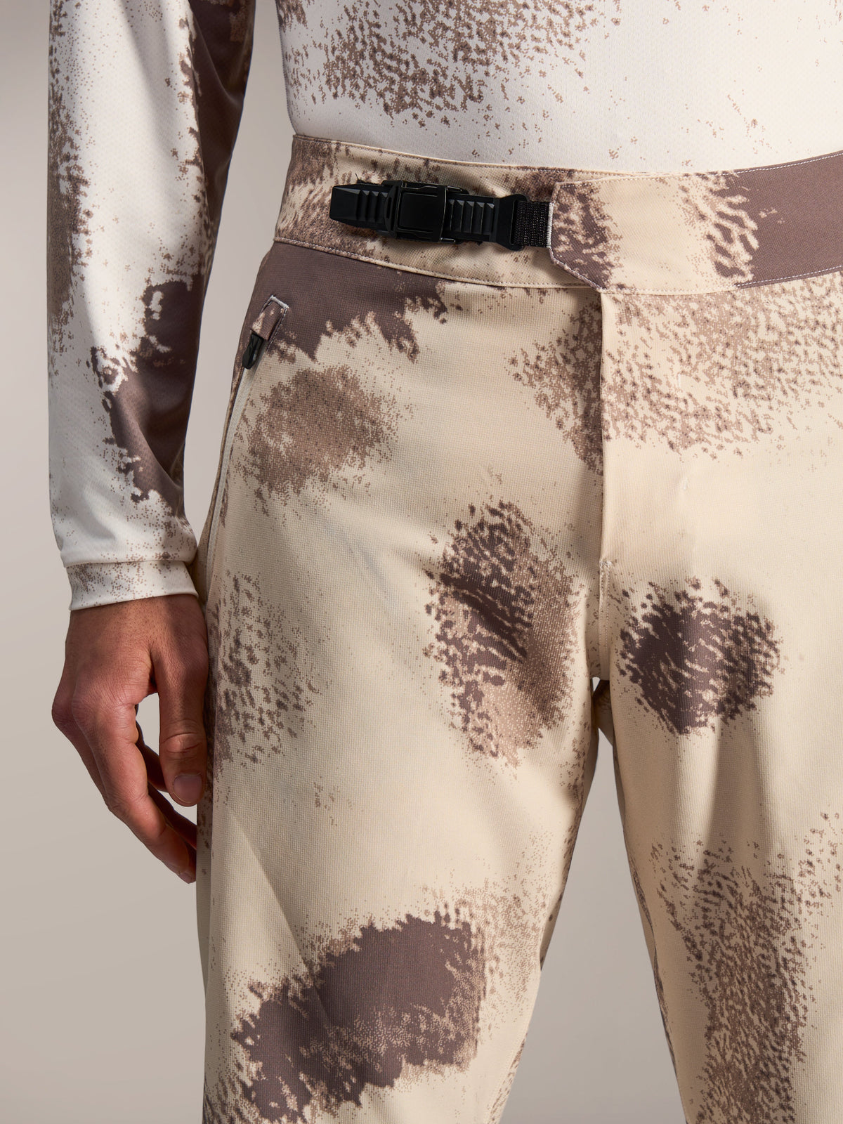 A-Dura Ride Shorts in Sand Camo with black ratchet waist closure, durable mountain bike apparel for off-road performance.