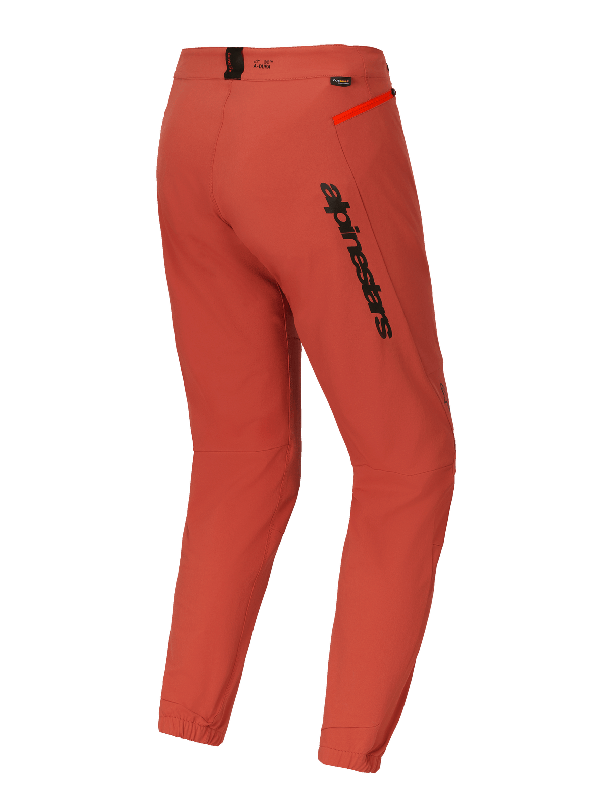 Alpinestars A-Dura Elite-byxor, mountainbike-byxor (MTB), mörkorange, trekvartsvy bakifrån med tydlig svart Alpinestars-logotyp på låret, klarorange dragkedjedetalj på höften och elastiska benslut, teknisk cykelutrustning