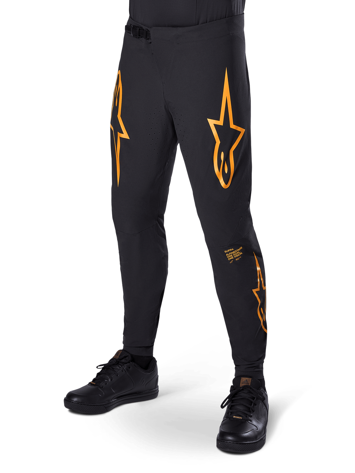 Alpinestars A-Supra Race Pants, Black with orange star graphics, MTB racing pants featuring laser-perforated ventilation and ratchet waist closure, slim performance fit for off-road cycling