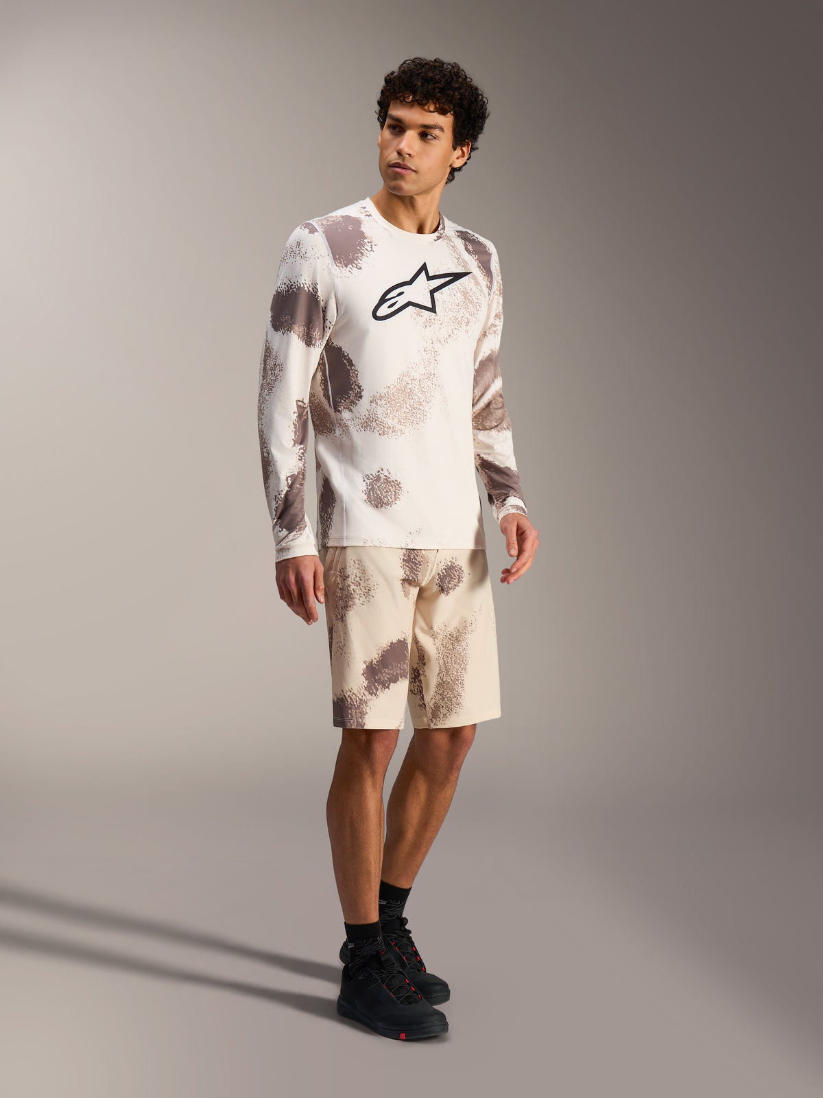 A-Dura Ride LS Jersey and Sand Camo Shorts, mountain bike performance gear with a bold chest logo and technical fit.