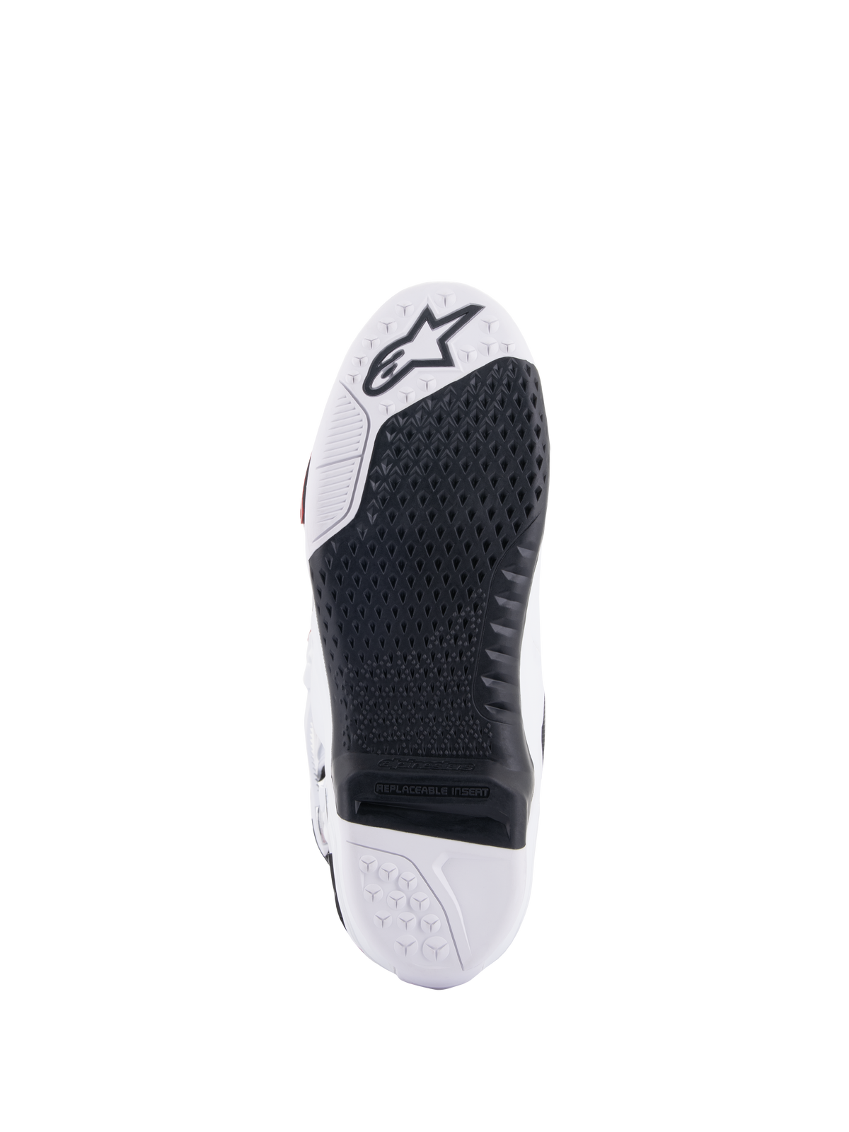 Alpinestars Tech 10-stövlar, motocross-stövlar, vy underifrån som visar den svarta utbytbara mittendelen och vit sula, texturerat greppmönster, Alpinestars stjärnlogotyp på tåpartiet, slitstarka stövlar för terrängkörning