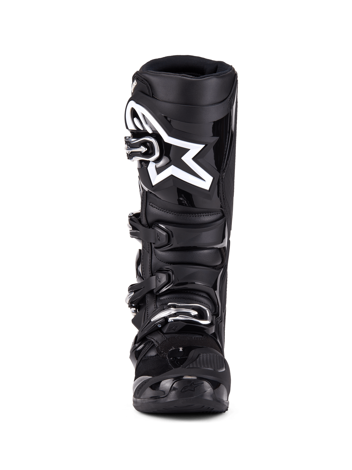 Alpinestars Tech 7-stövlar, motocross-stövlar, svarta, vy framifrån med stängningssystem med fyra spännen, framträdande vit Alpinestars-stjärnlogotyp på skenbensplattan, hållbart TPU-skal och förstärkt skydd för terrängkörning