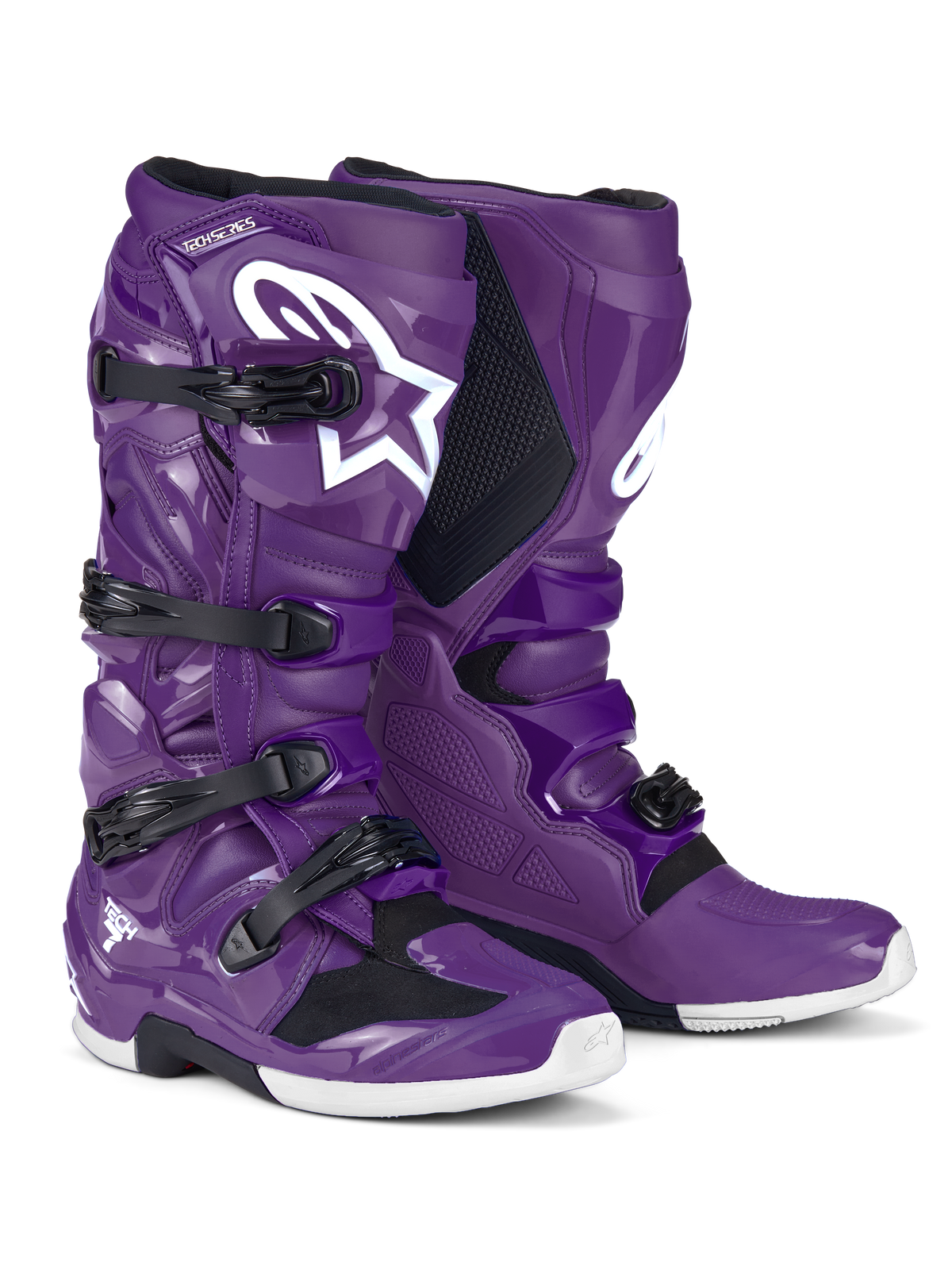 Alpinestars Tech 7 Boots, motocross-stövlar, lila med svarta spännen och en stor vit Astars-logotyp, högpresterande skyddande design med stängning via fyra remmar och hållbart TPU-skal för terrängkörning