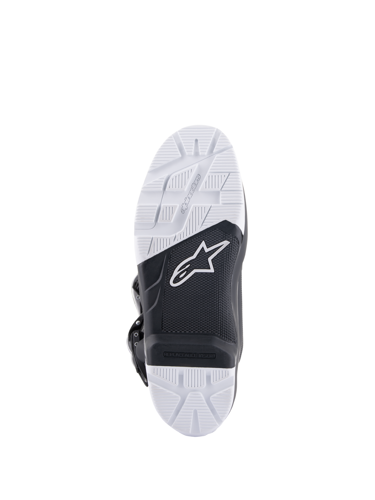 Alpinestars Tech 7 Enduro Drystar®-stövlar, detaljvy av sulan, höggrepps svart och vit gummiblandning med dubbel densitet, med Alpinestars-logotyp och utbytbar fotpinne-insats, designad för grepp vid terräng- och endurokörning.