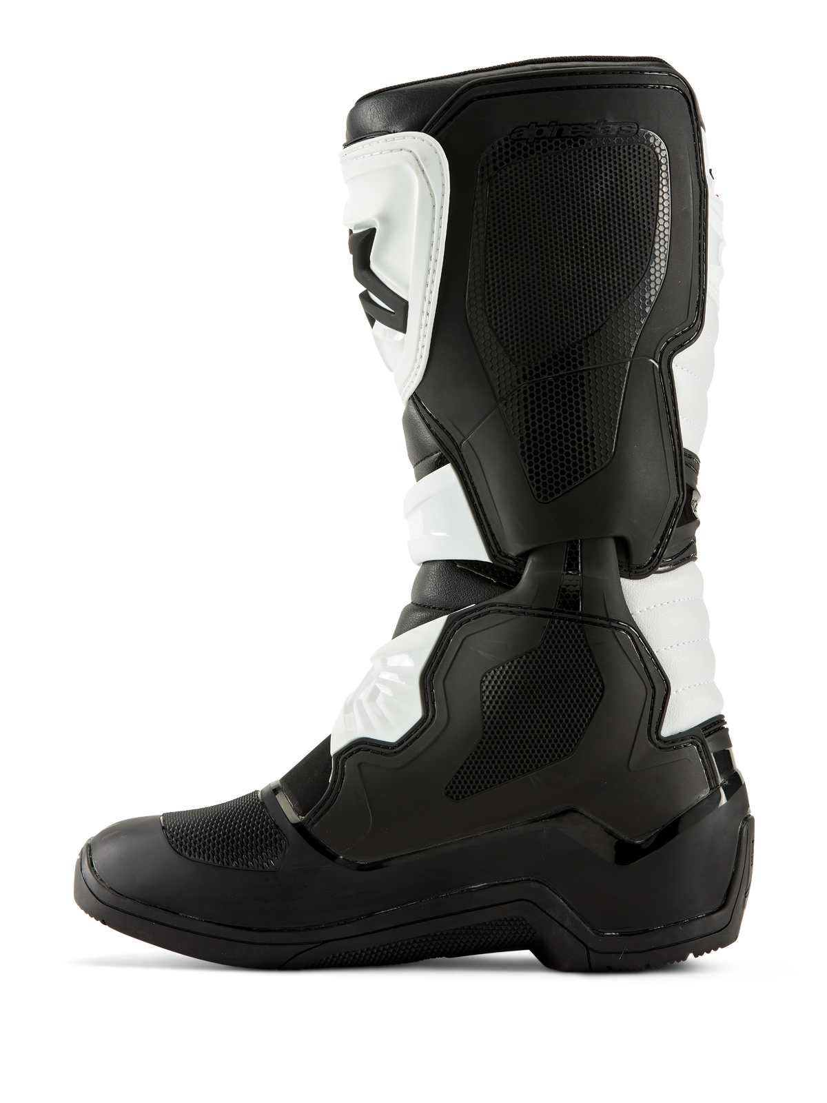 Alpinestars Tech 3-stövlar, motocross-stövlar, svarta och vita, medial sidoprofil med texturerade greppaneler, TPU-skydd och slitstark mikrofiberkonstruktion, professionella offroad-stövlar.