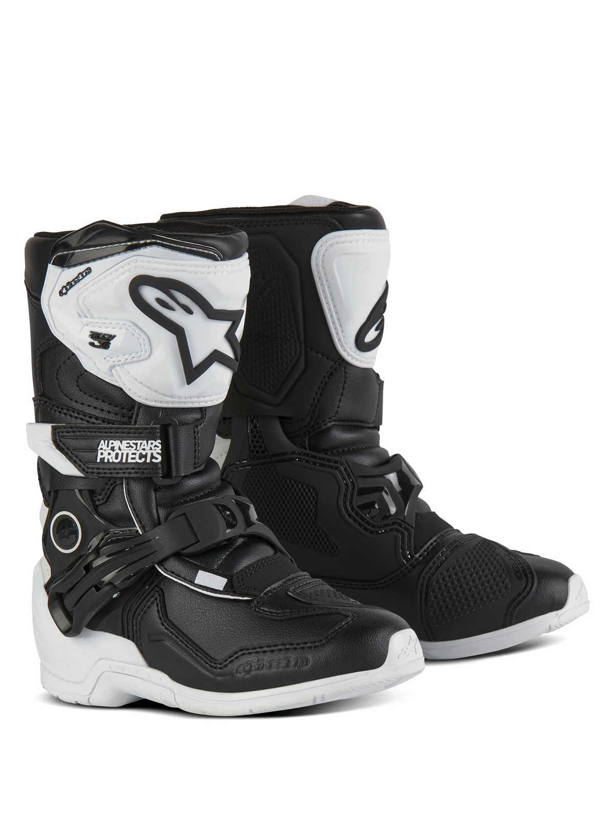 Alpinestars Tech 3S stövlar för barn, motocross-stövlar, svarta och vita, med vita TPU-skenbensplattor och svarta Alpinestars-logotyper, justerbara spännen och kardborrestängning, hållbara gummiyttersulor för offroad-skydd för barn