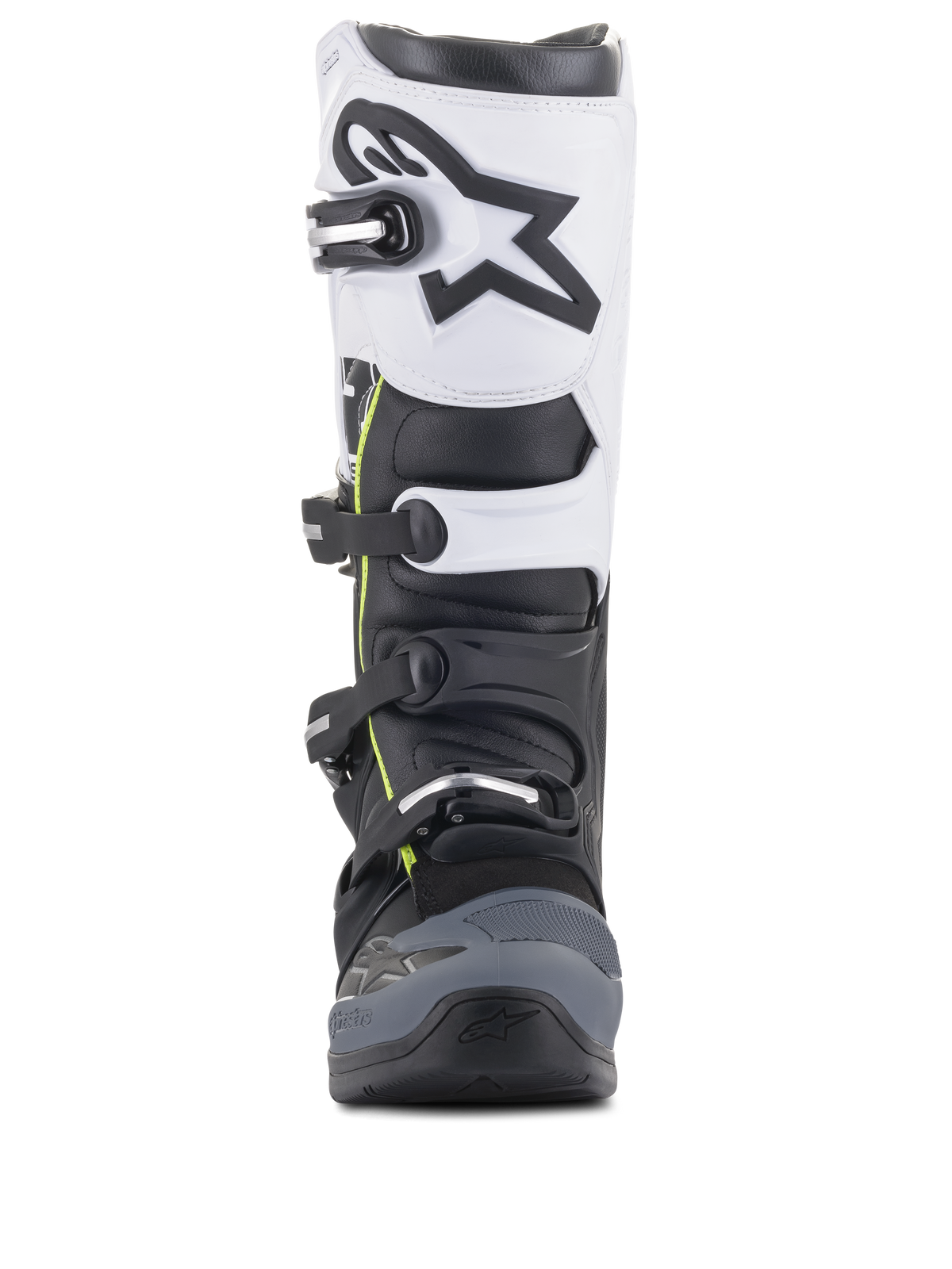 Alpinestars Tech 5-stövlar, motocross-stövlar, svart, mörkgrå och vit, vy framifrån med ett spännsystem med flera spännen, vit övre panel med svart Astars-logotyp, mörkgrå förstärkt tå och subtila gula detaljer