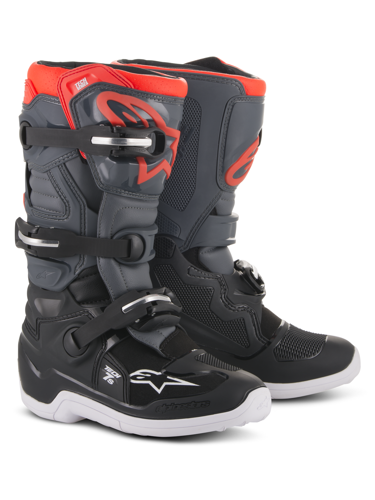 Alpinestars Youth Tech 7S Boots, Motocross Boots, Black Dark Gray and Red Fluorescent, featuring a four-buckle closure system, protective TPU shin plate, white outer sole, and red Alpinestars logo, designed for youth off-road riders.