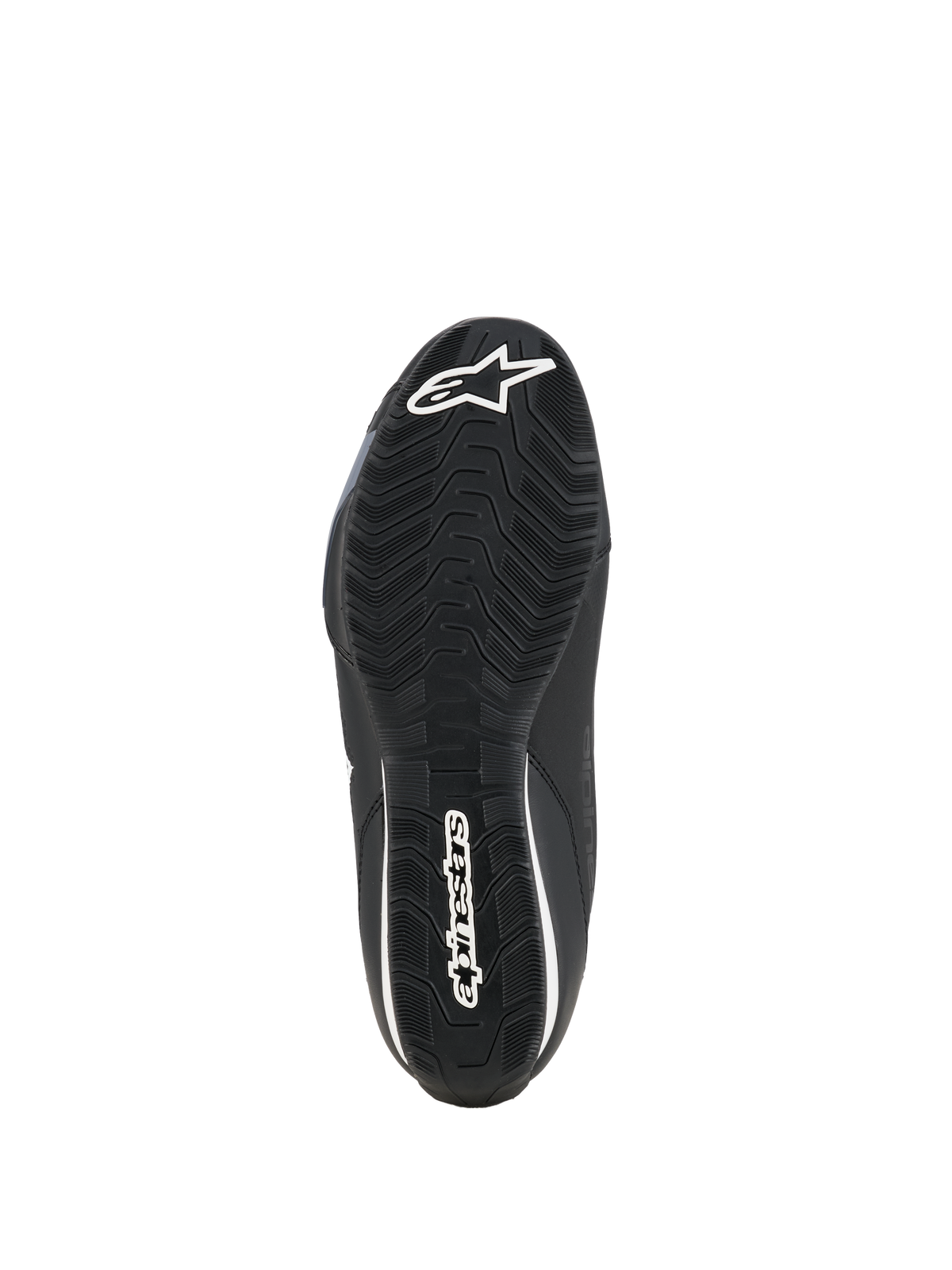 Alpinestars Celer-skor, motorcykelskor, svartvita, vy av undersidan på den oljebeständiga gummisulan med texturerat greppmönster och vit Alpinestars-logotyp.