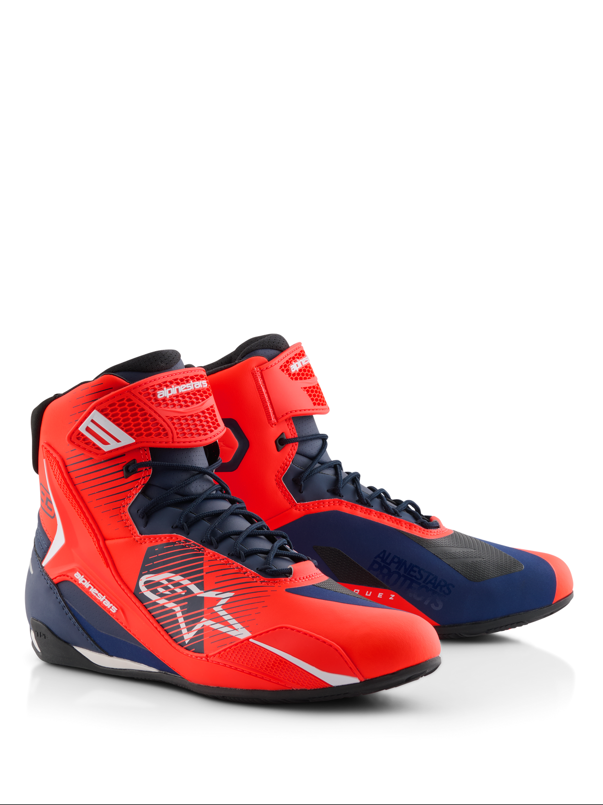 Alpinestars MM93 Faster-4 Shoes, motorcycle riding shoes in Red Fluo and Dark Blue, featuring a lace-up closure with a top ankle strap, white Alpinestars logos, and technical microfiber construction for road and sport riding.