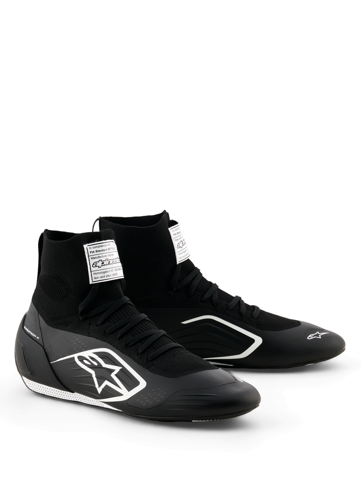 Alpinestars Supertech K Shoes - FIA, Karting Shoes, Black and White, fully knitted upper with high-top sock-like fit, white Alpinestars logo on the side, white FIA certification label on the tongue, sleek lightweight design for racing performance