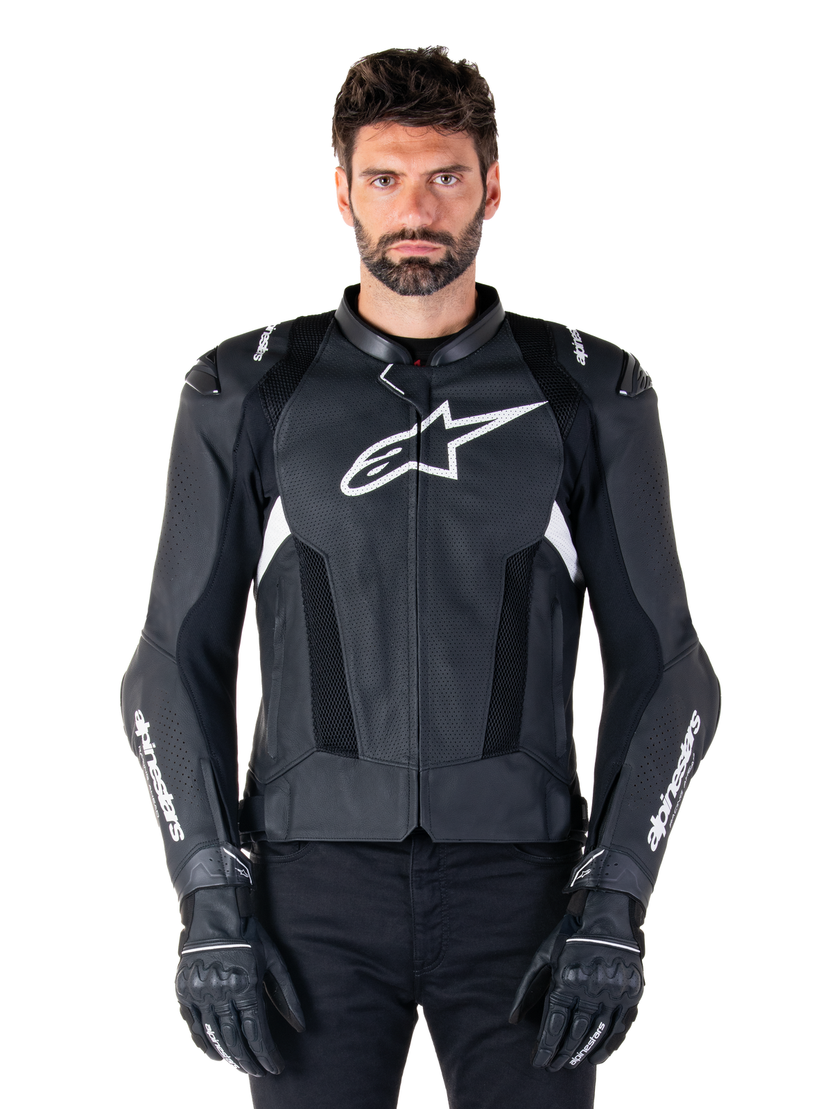 Alpinestars Missile V3 Airflow läderjacka, svart och vit, motorcykelracerjacka med perforerade ventilationspaneler i läder, stor vit stjärnlogotyp på bröstet, bärs med matchande handskar, sportig skyddsdesign