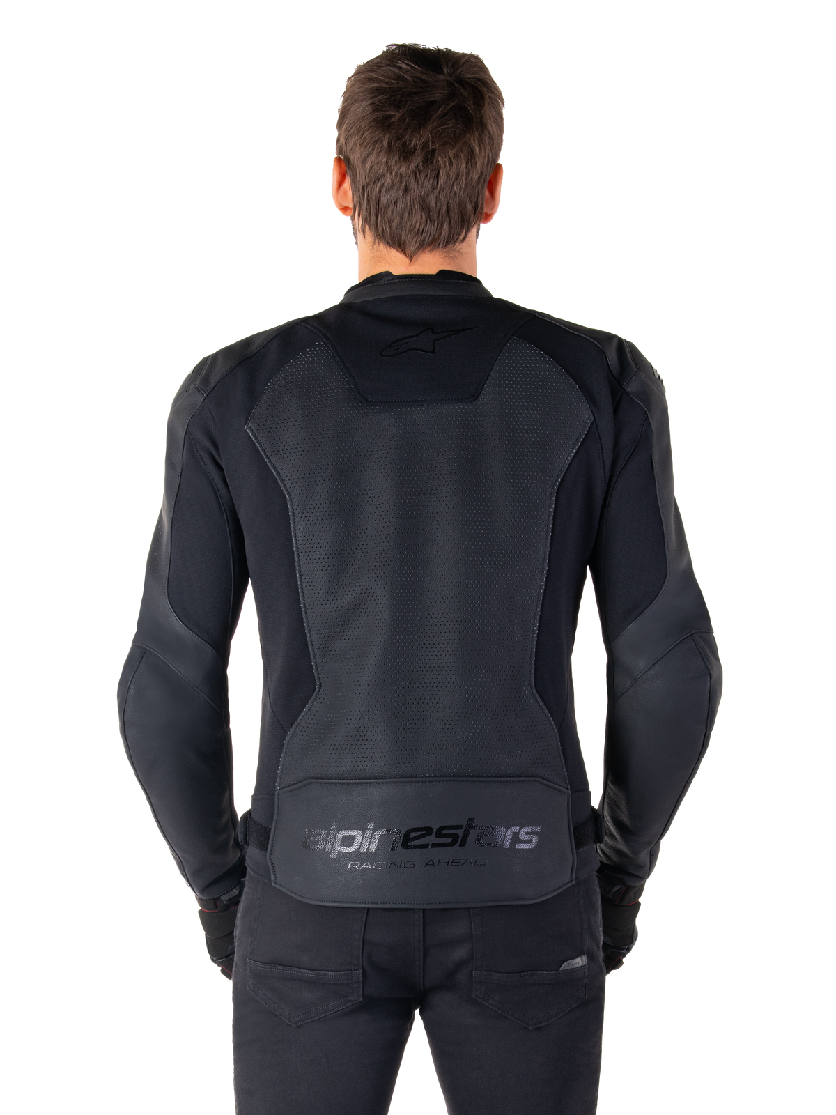 Alpinestars Faster V3 Airflow läderjacka, ryggvy på modell, svart, med perforerad läderpanel på ryggen för luftflöde, subtil logotyp och ergonomisk sportig passform