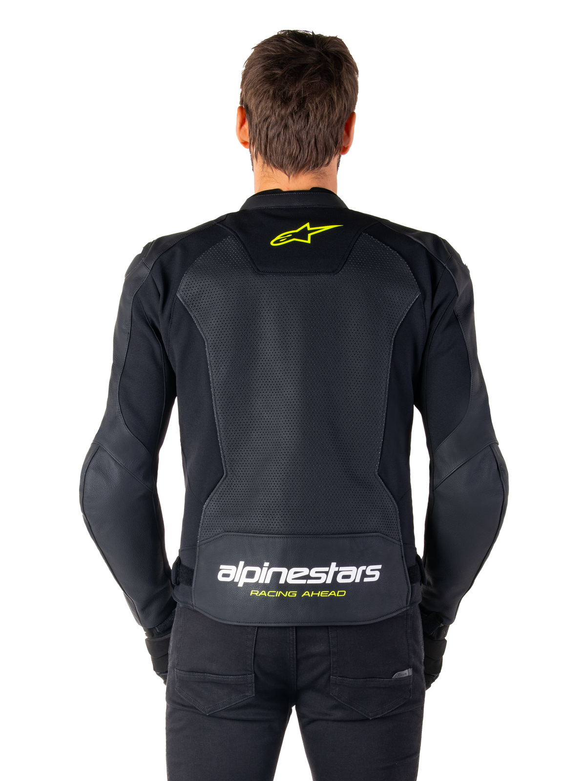 Alpinestars Faster V3 Airflow läderjacka, sportig mc-jacka, svart med neongula detaljer, vy bakifrån som visar stora perforerade läderpaneler, gul stjärnlogotyp på övre ryggen och framträdande logotyp på nedre ryggen.