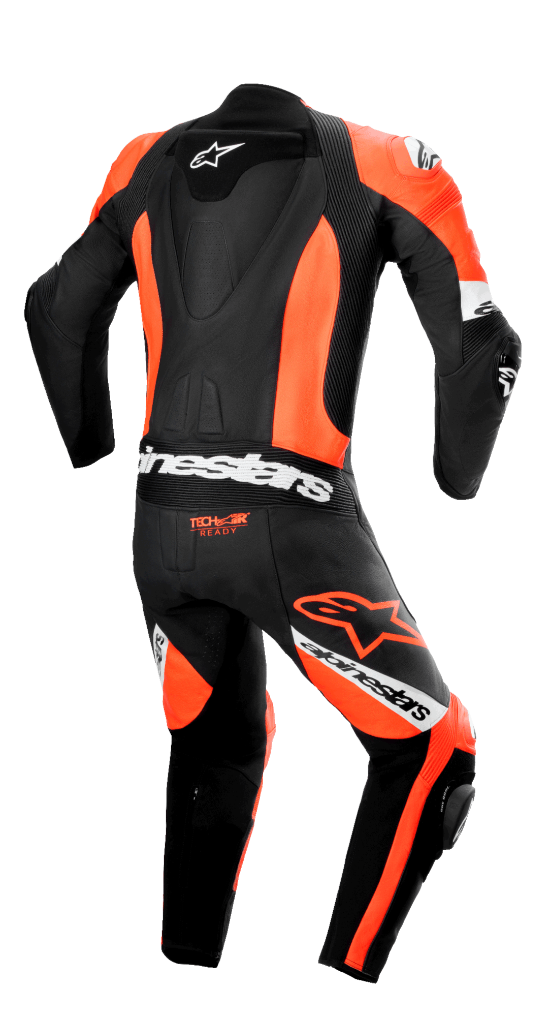 Alpinestars Missile V2 Ward skinnställ i ett stycke, vy bakifrån, svart och fluorescerande röd med vita detaljer, med en strömlinjeformad ryggpuckel, dragspelsstretchpaneler på ländryggen och knäna, 'Tech-Air Ready'-logotyp och framträdande Alpinestars-varumärke för professionell bankörning.