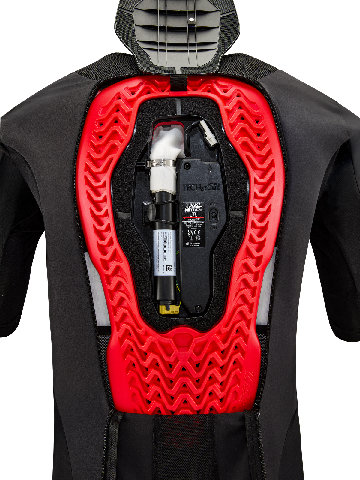 Alpinestars Tech-Air 5 Plasma Airbagsystem, invändig vy som visar den installerade svarta reservpatronen och den elektroniska styrenheten, integrerad i ett klarrött Nucleon Plasma-ryggskydd i en svart skyddsväst