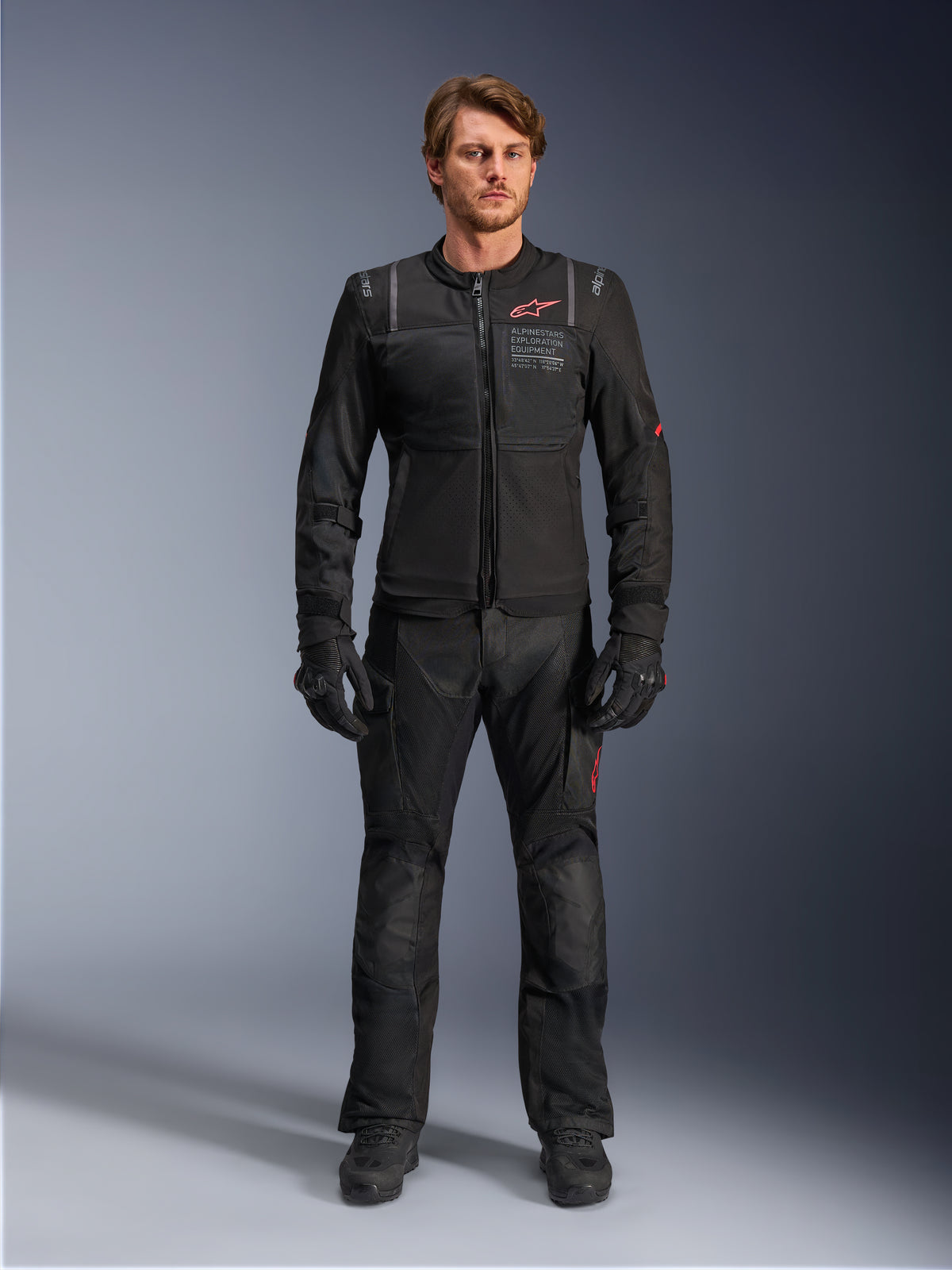 Alpinestars ST-2 Air Jacket, men's adventure touring motorcycle jacket, black textile with mesh panels, shown on-model.