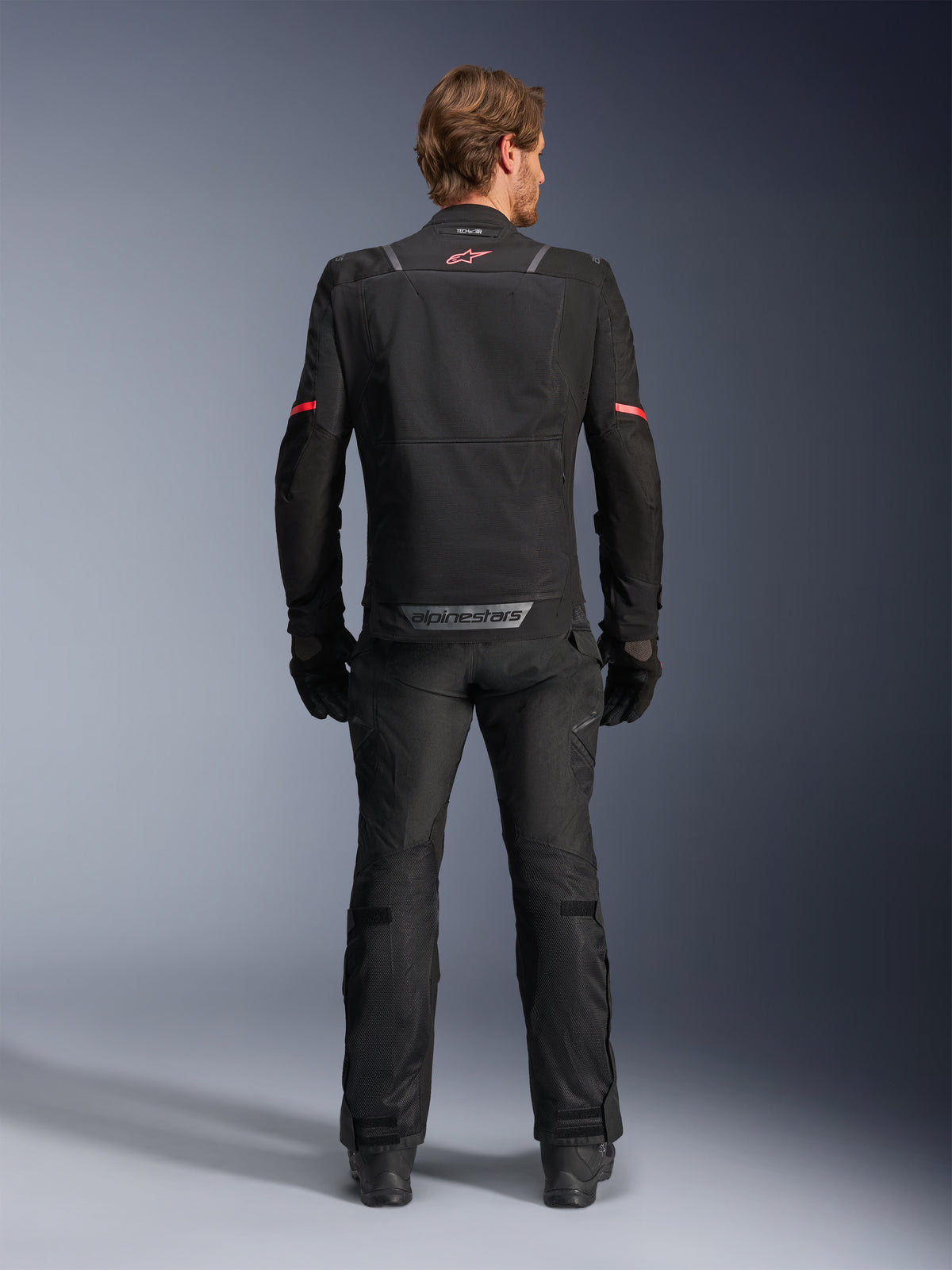 Alpinestars ST-2 Air Jacket, black motorcycle touring jacket for men, featuring back mesh ventilation panels.