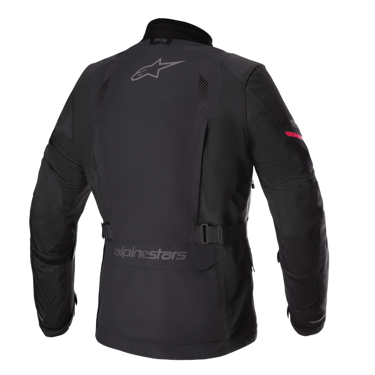 Alpinestars Monteira Drystar® XF jacka, adventure touring-motorcykeljacka, svart med klarröda detaljer på ärmarna, bakprofil som visar gråa Alpinestars-logotyper, justerbart midjebälte och slitstarkt vattentätt textilskal