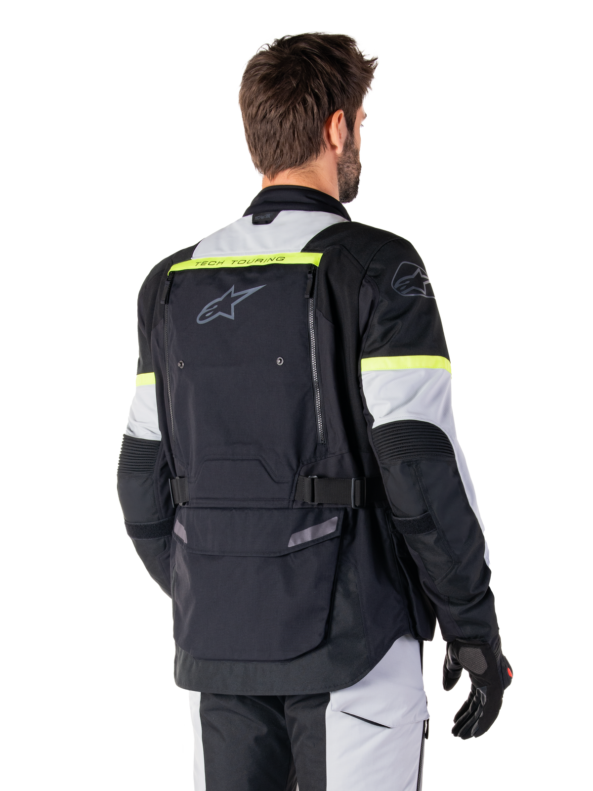 Alpinestars Bogotá Pro Drystar jacka, adventure-touringjacka i textil för herr, svart och gul fluo, vy bakifrån.