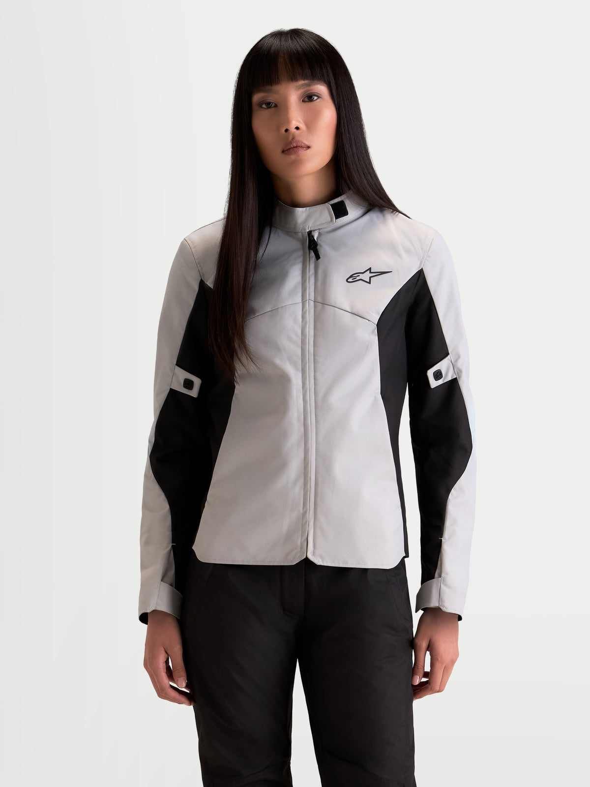 Alpinestars Stella C-1 Waterproof Jacket, women's urban motorcycle riding jacket in ice gray and black, front view worn by a model