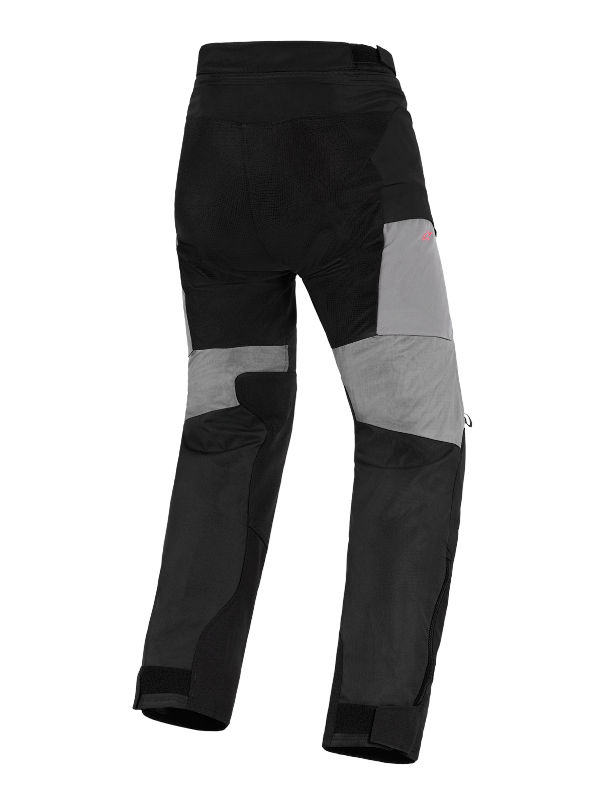 Alpinestars Stella Andes V4 Drystar® byxor, äventyrsbyxor för damer, svarta och mörkgrå, bakifrån sedda med grå paneler på benens baksida, slitstarka ripstop-förstärkningar vid sätet och stretchzoner för rörlighet i en vattentät textildesign.