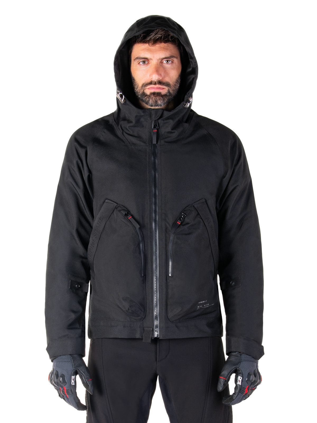Alpinestars Morush vattentät parka, urban motorcykeljacka för herrar, svart, textil med stormsäker huva, bärs av modell.