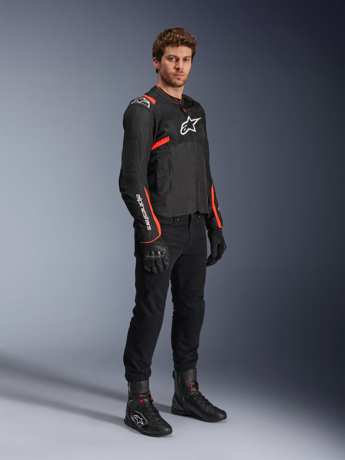 Alpinestars T-SPS Air V2 jacka, motorcykeljacka för herrar, svart och röd fluo, textil med ventilerande meshpaneler.