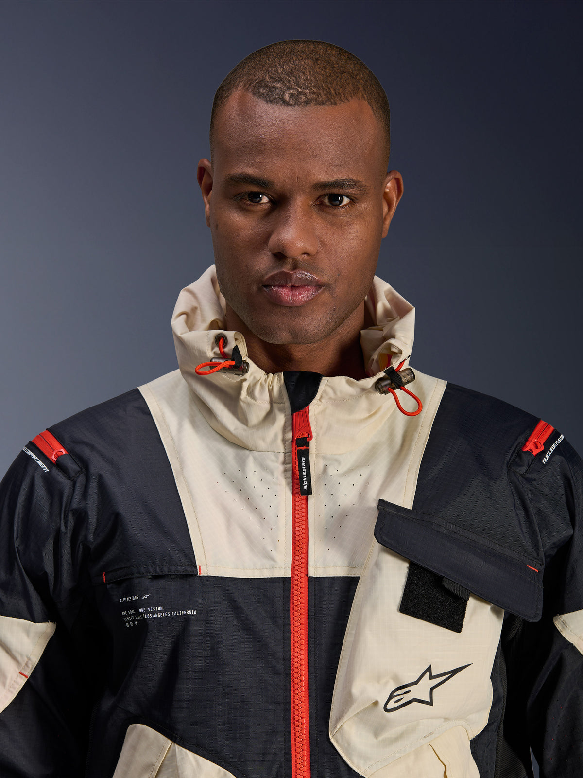 Alpinestars Mogress Air jacka, urban motorcykeljacka för herrar, svart, almond och orange ripstop-textil med huva.