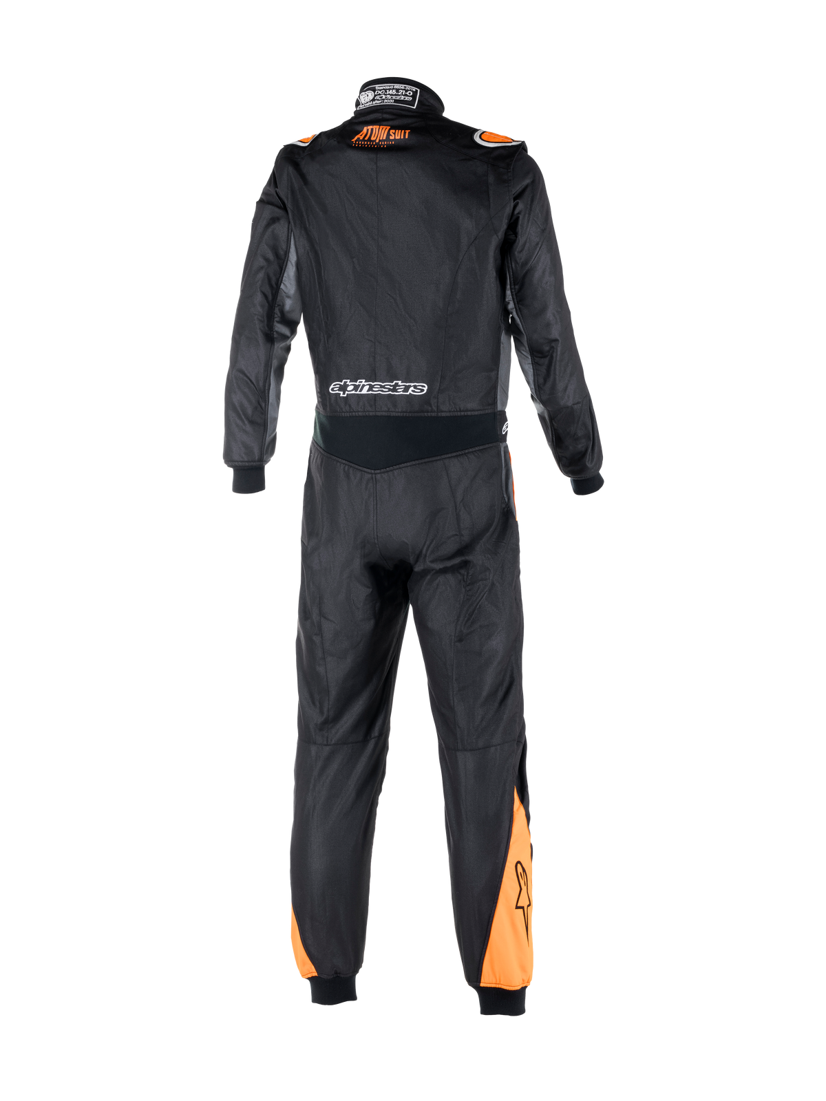 Alpinestars Atom Graphic racingoverall, FIA-certifierad bilsportsoverall i ett stycke, svart och fluororange, vy bakifrån som framhäver stretchpanel i midjan, varumärkeslogotyper och flamsäker aramidkonstruktion.