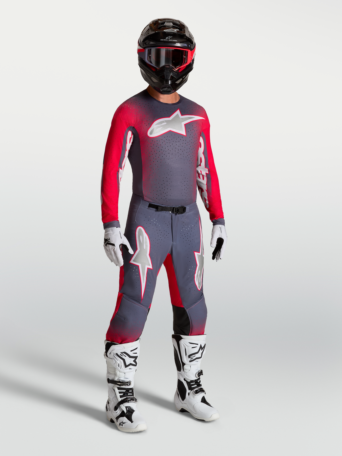 Alpinestars Supertech Hiten AFD gear set och byxor, motocrossutrustning för herr, grå och fluorescerande röd, racingdesign.