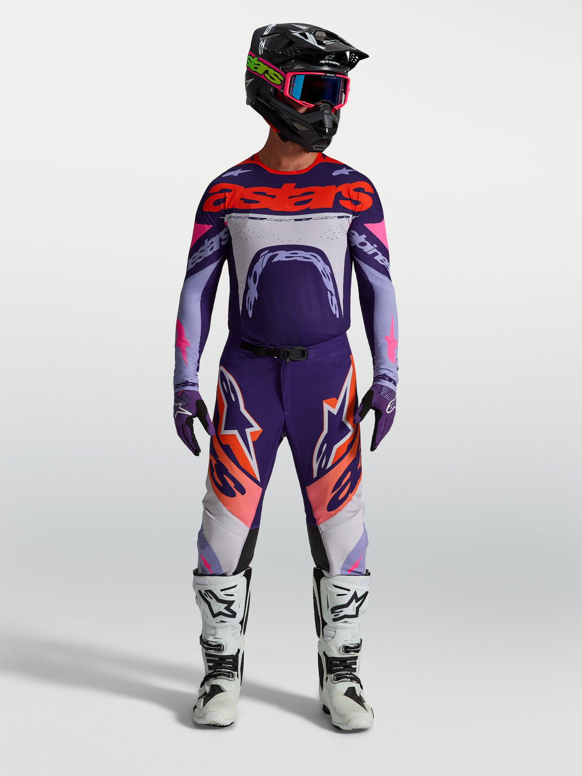 Alpinestars Supertech Dyna gear set, lila och rosa motocrossutrustning för herrar, tröja och byxor för terrängkörning.