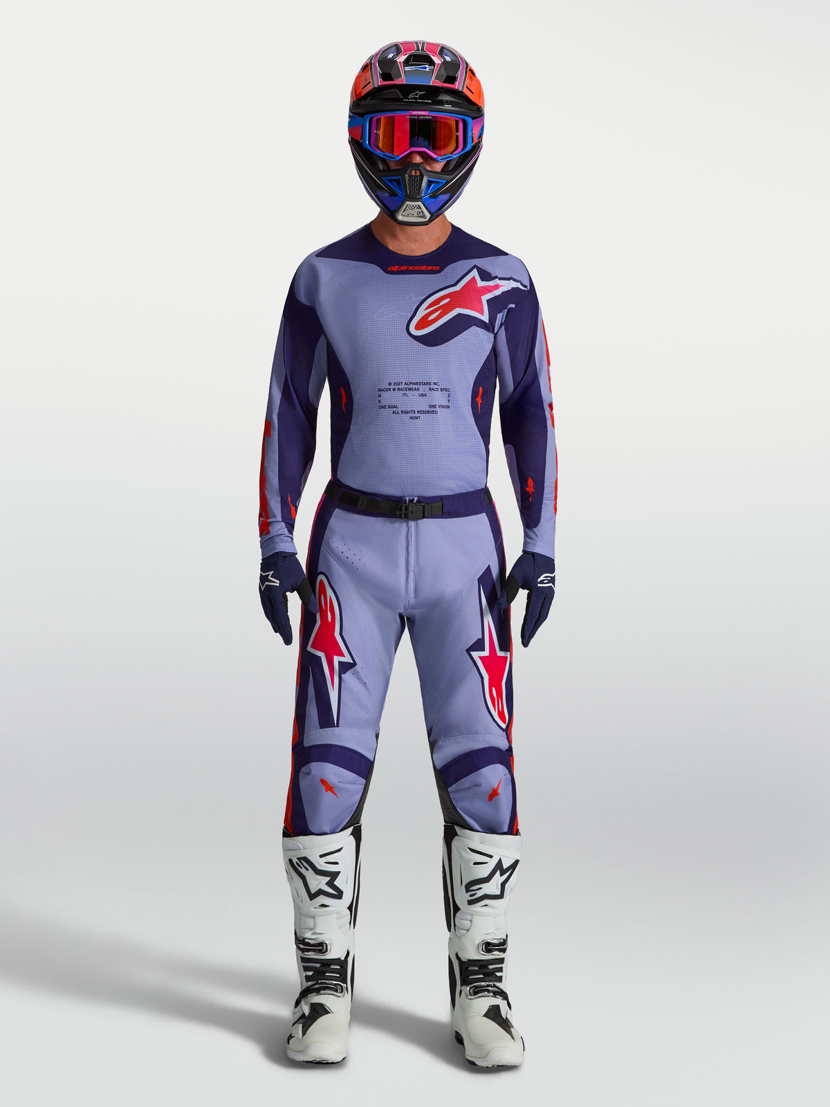 Alpinestars Racer Air Hunt byxor, herrmotocrossbyxor i ljuslila och rosa fluo med ventilerande mesh för luftflöde.