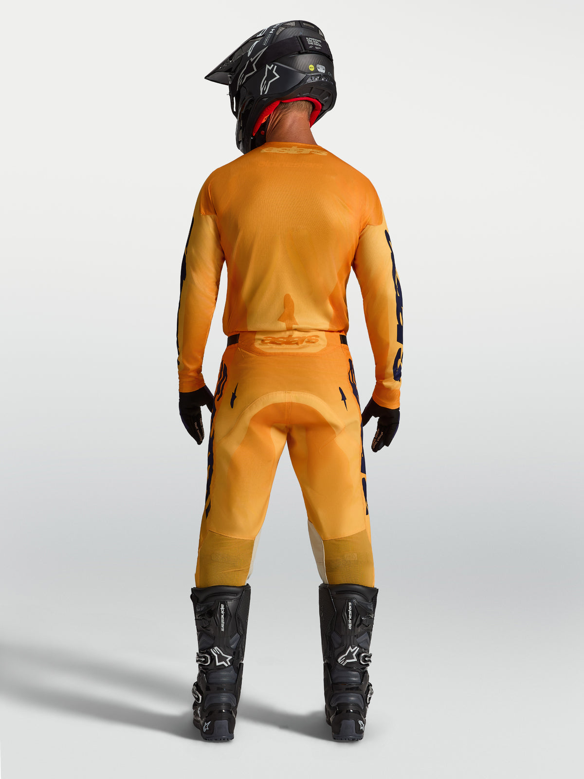 Alpinestars Racer Amber Pants, Men's Motocross Riding Gear, Back View, Orange and Deep Blue, Durable Synthetic Construction.