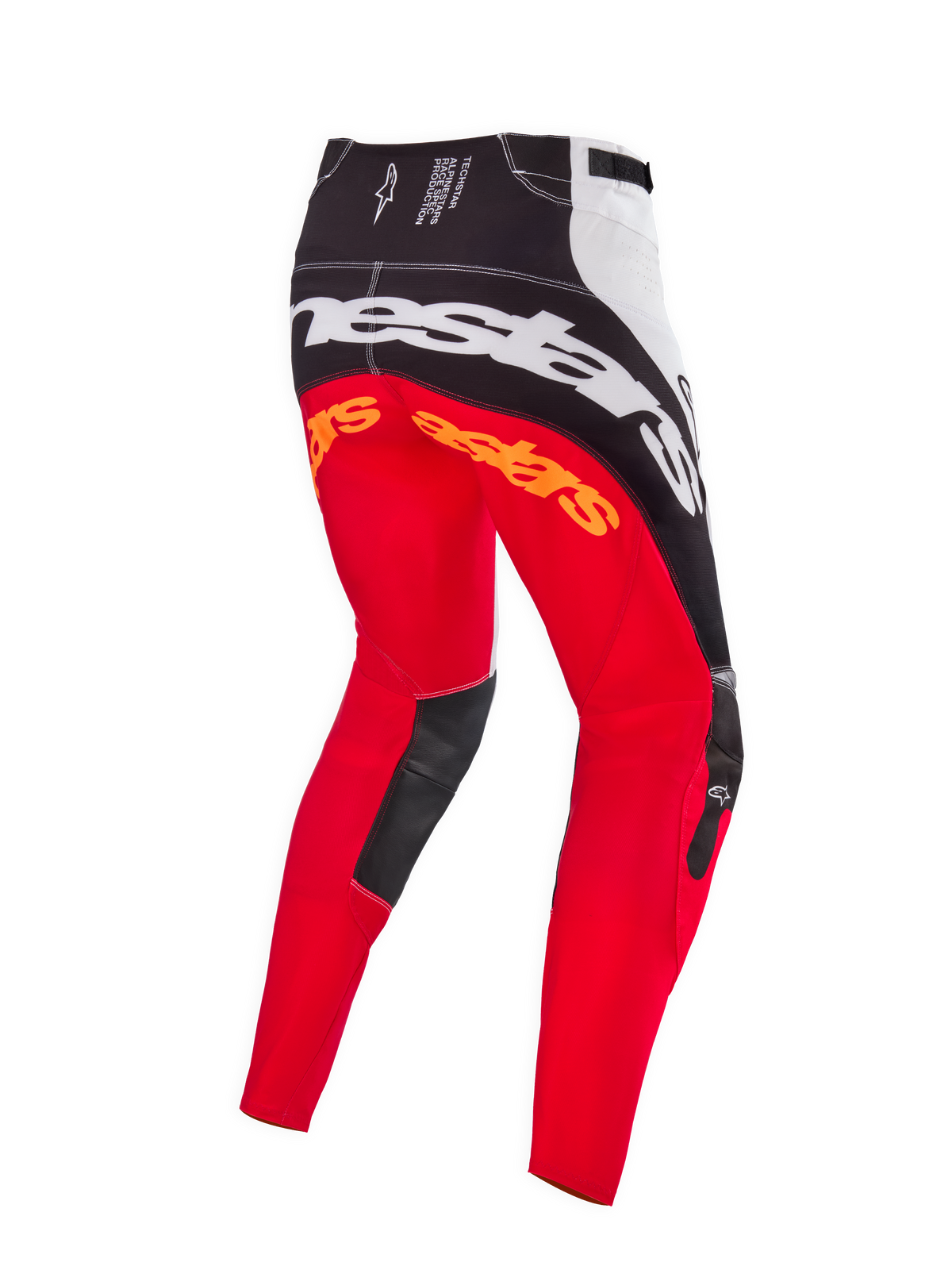 Alpinestars Limited Edition Techstar Deep motocrossbyxor, färgställning Black White High Red, baksida som visar stor vit Alpinestars-logotyp över sätet, orange logotyper på låren och svarta läderpaneler på knänas insida, designade för professionell terrängkörning.