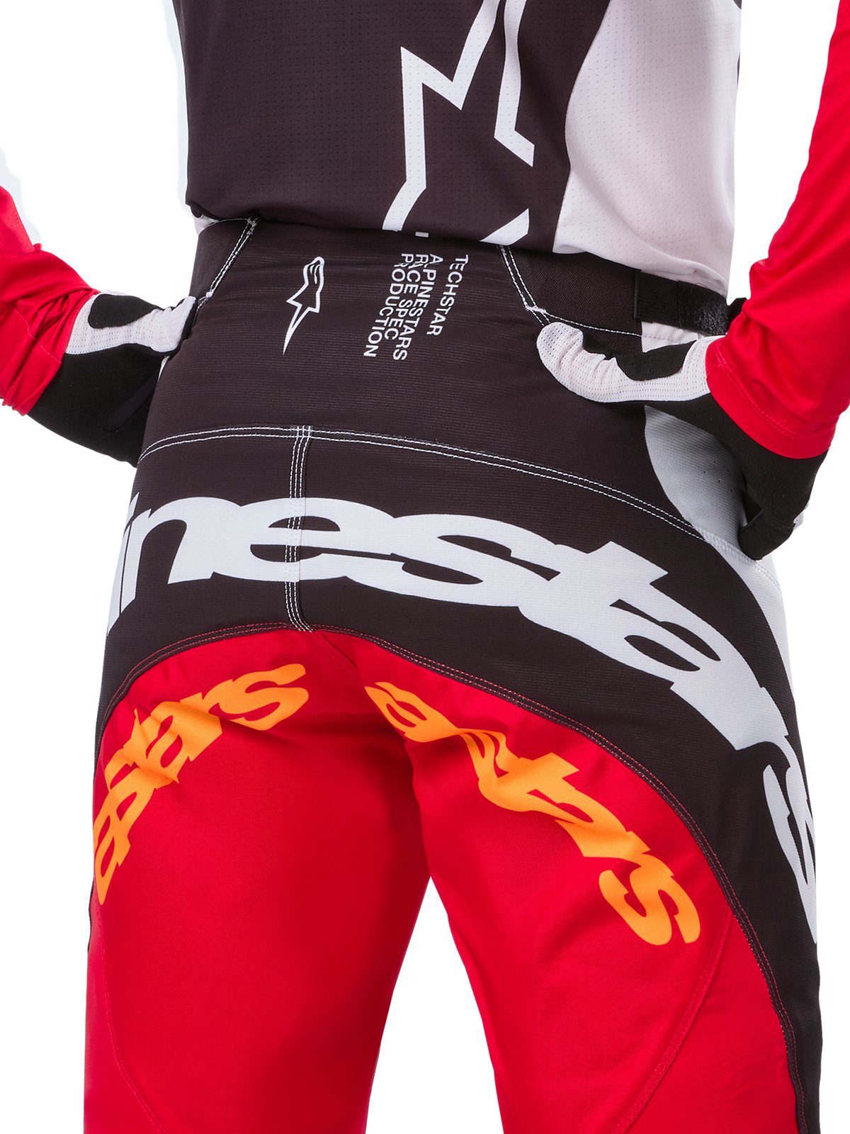 Alpinestars Limited Edition Techstar Deep-byxor, motocrossbyxor, svart, vit och High Red, med multipanel-design, förstärkta knän och 4-vägs stretchpaneler för terrängprestanda.