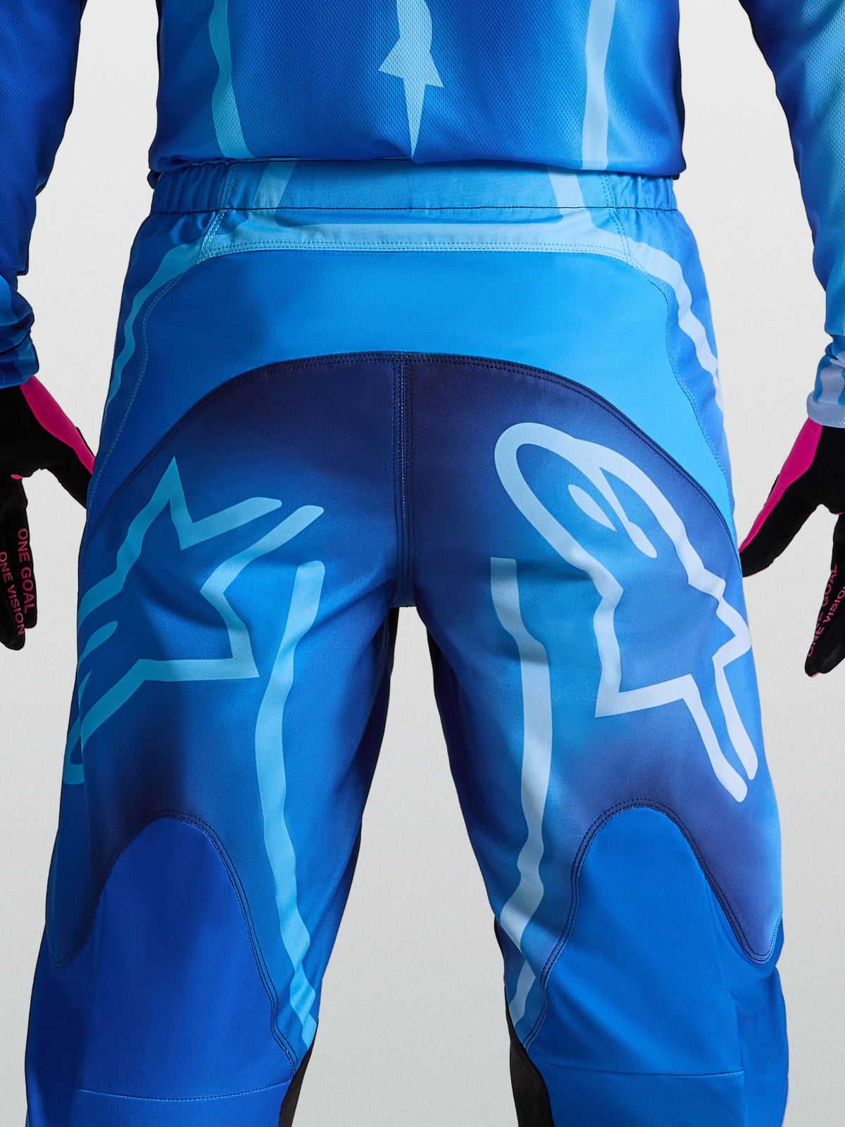 Alpinestars Fluid Kepler Pants, Blue Motocross Gear with durable 600D polyfabric and large rear logo graphics.