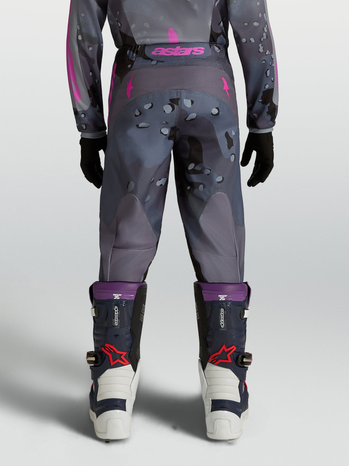 Alpinestars Youth Fluid Lone Pants for motocross, Gray Camo and Purple textile, rear view on model.