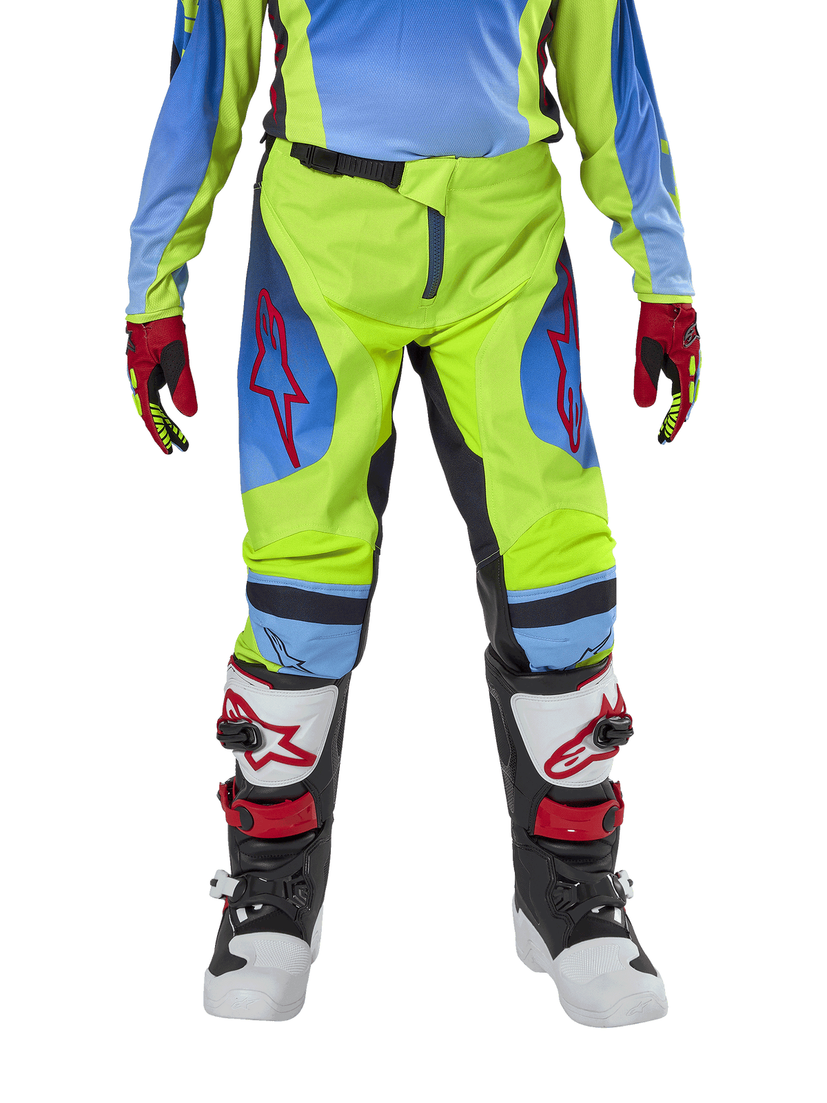 Alpinestars Youth 2024 Racer Hoen byxor, motocrossbyxor för ungdomar, neongul och mörkblå (Blue Night Navy), med röda stjärnlogotyper på låren, bärs med matchande tröja, röda och svarta handskar samt vita, svarta och röda motocross-stövlar, hållbar utrustning för terrängkörning