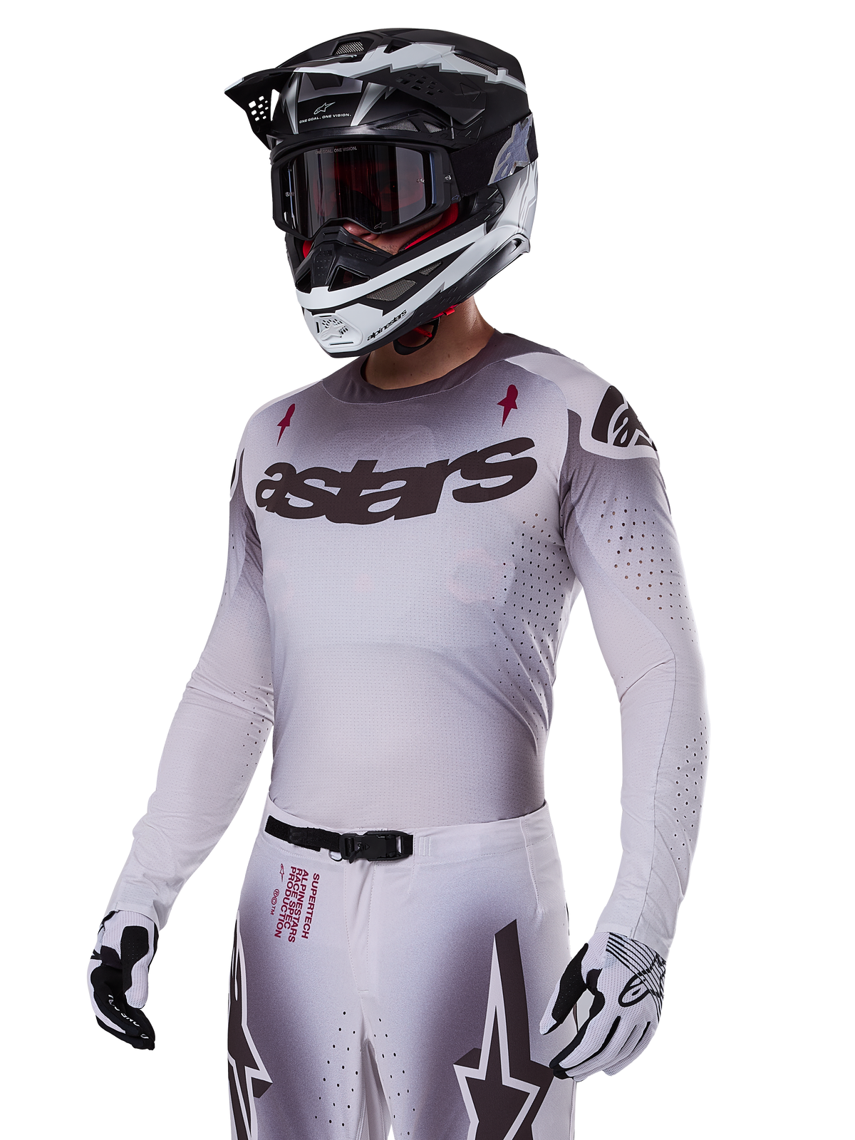 Alpinestars 2025 Supertech Maker-tröja, motocrosströja, silver och svart gradient, andningsbar stretchmesh med laserskurna perforeringar, bärs med matchande byxor och hjälm, med 'astars'-logotyp, komplett professionell terrängutrustning