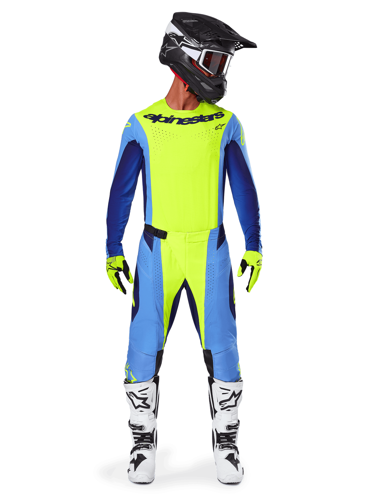 Motocrossförare i komplett tävlingsutrustning, Alpinestars 2025 Techstar Melt-tröja i neon gult och blått, matchande gula och blå motocrossbyxor, svart hjälm med vit grafik och goggles, vita och svarta stövlar, gula och svarta handskar, koordinerad utrustning för terrängkörning