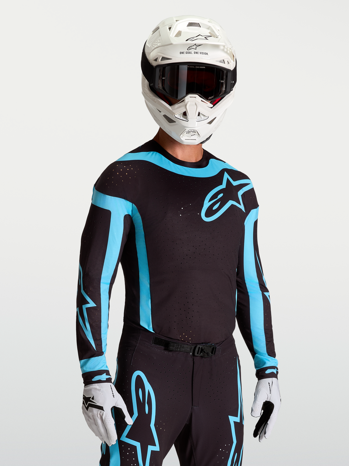 Alpinestars Supertech Vesta tröja, svart och turkos motocross-tröja för herr med laserutskurna ventiler och racingpassform.