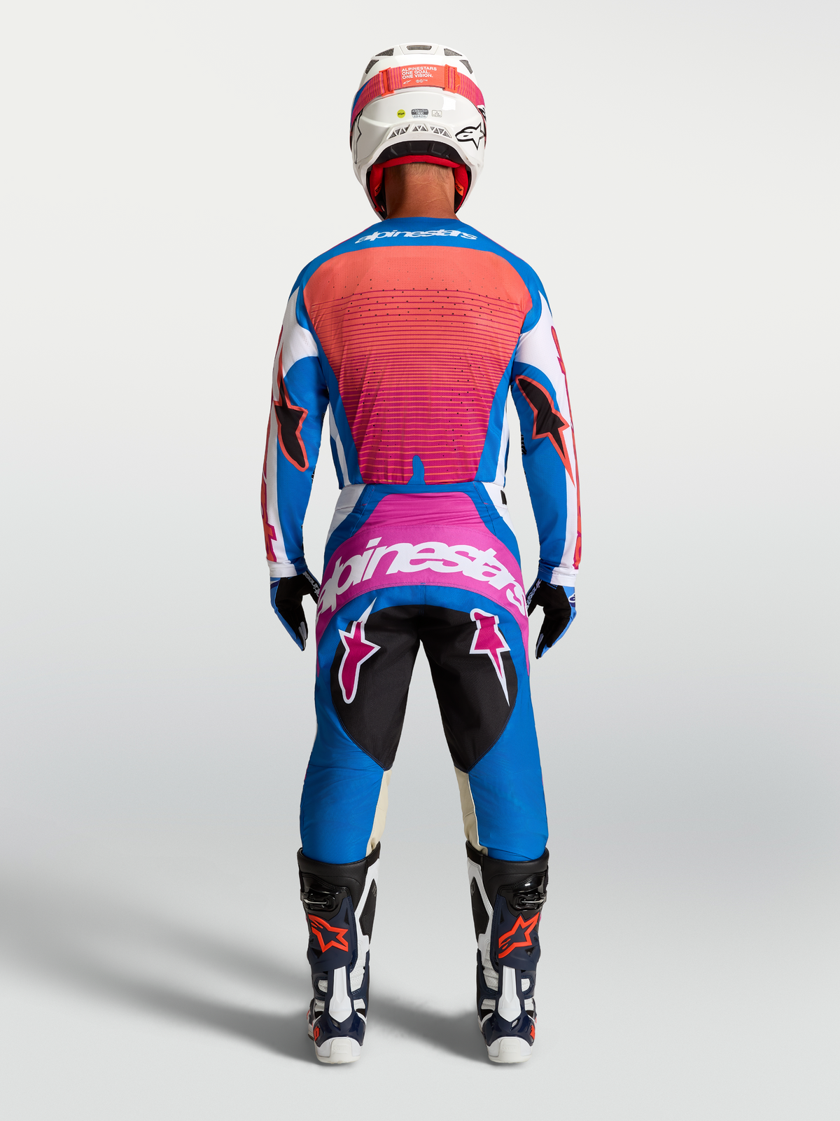 Alpinestars Techstar Maven tröja och utrustningsset, blå och hot coral motocrossutrustning, vy bakifrån.