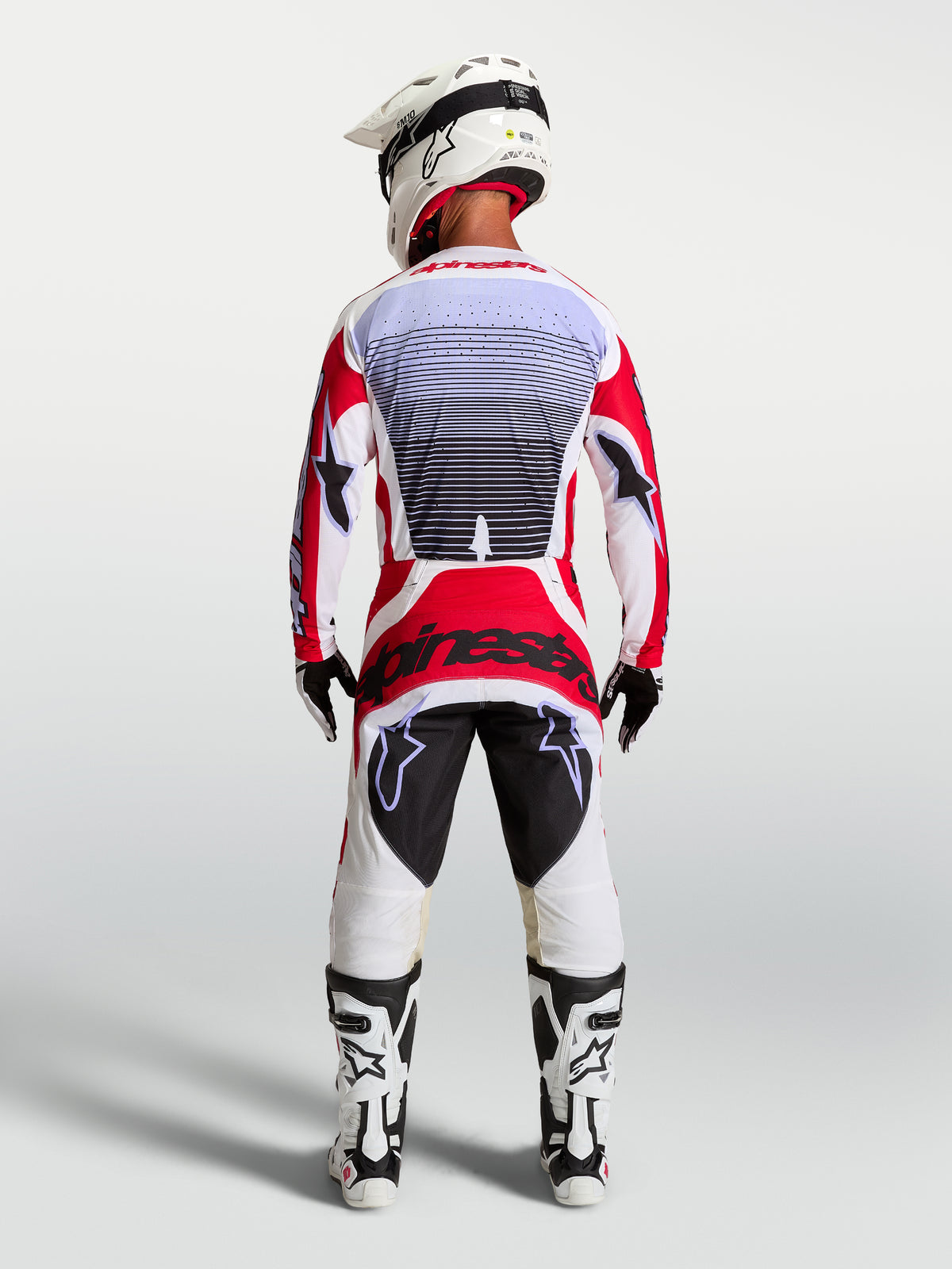 Alpinestars Techstar Maven gear set för herr, röd och vit motocrosströja och byxor, atletisk passform, vy bakifrån