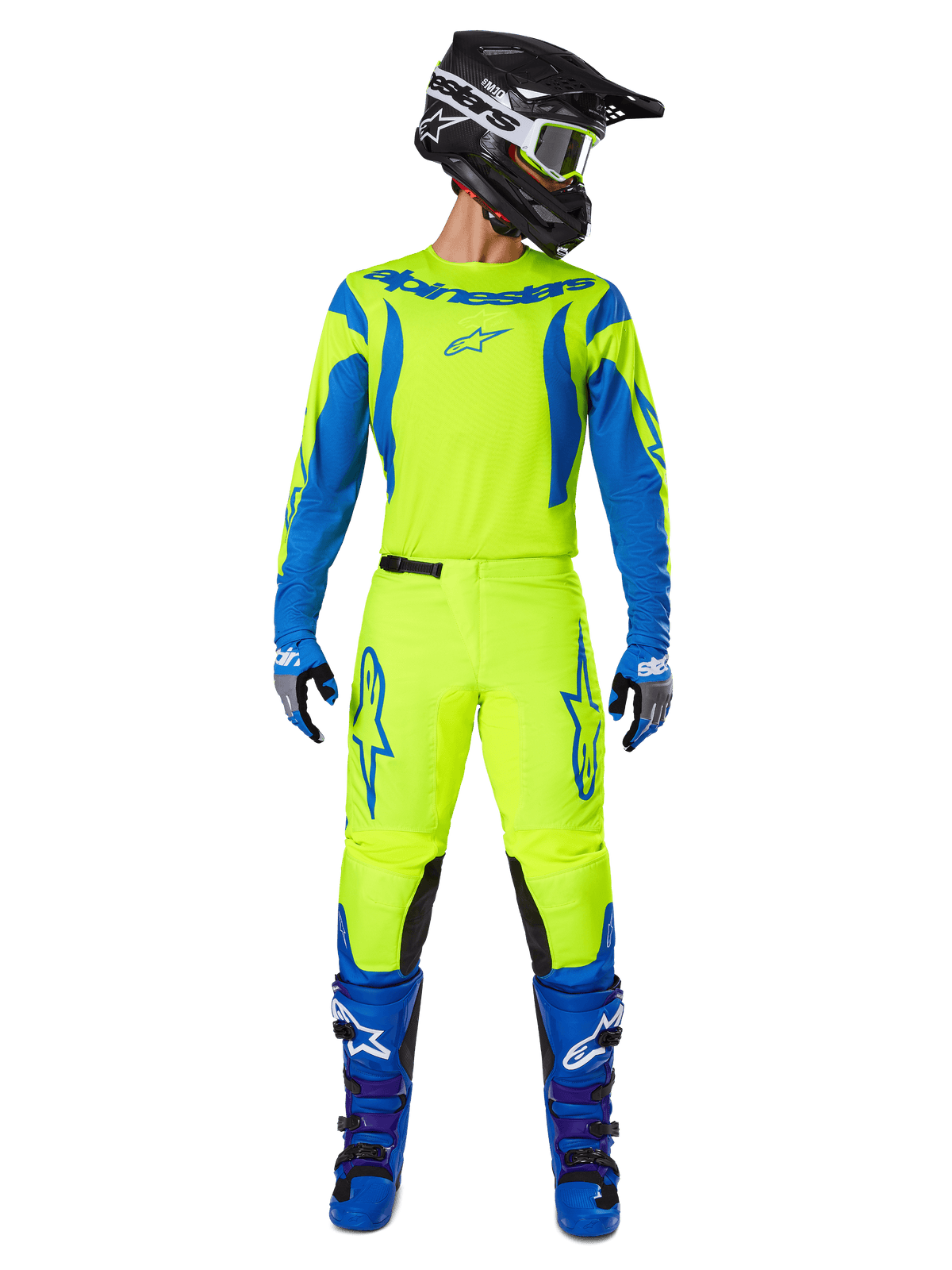 Alpinestars 2025 Fluid Haul utrustningsset, motocrosströja och byxor i gul fluo och blått, bärs med matchande blå stövlar och en svart hjälm, framträdande Astars-logotyper och en atletisk ergonomisk passform för terrängkörning.
