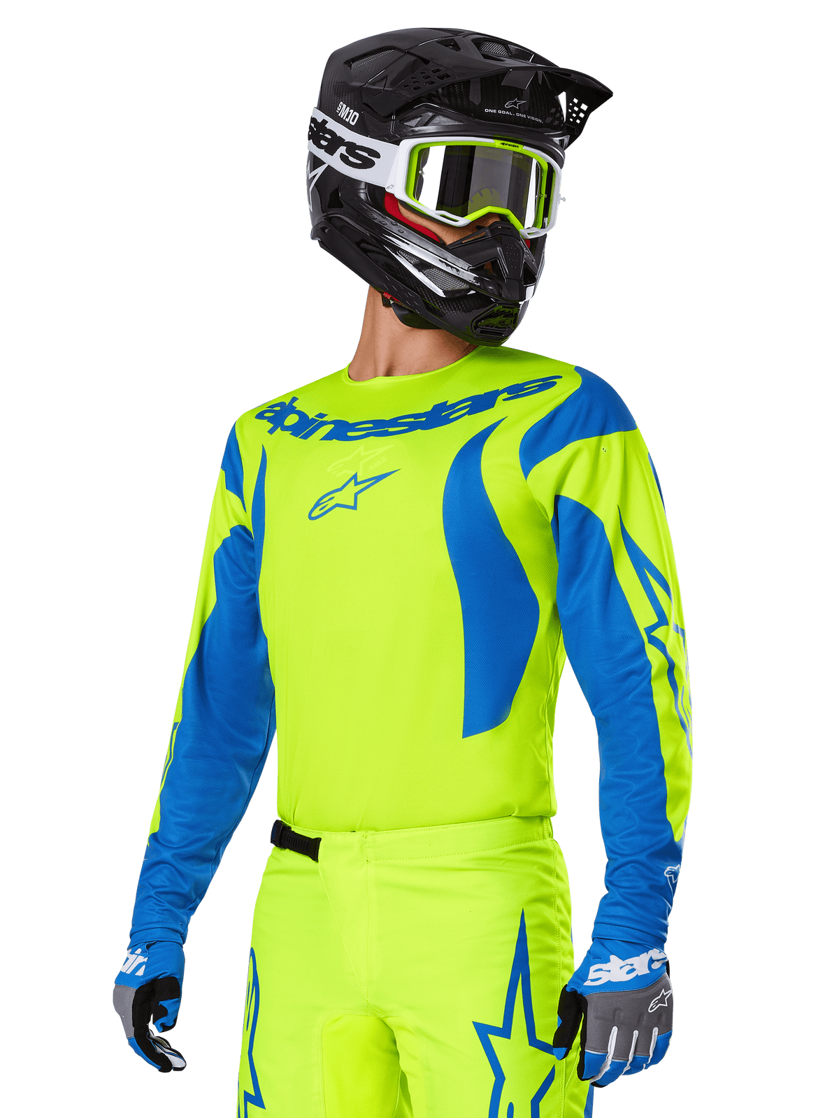 Alpinestars 2025 Fluid Haul-utrustningsset, motocrosströja och byxor, klar gul och blå, bärs med en svart hjälm och goggles med gula bågar, har vågliknande blå mönster på ärmarna och blå stjärnlogotyper på byxorna, matchande outfit för terrängkörning